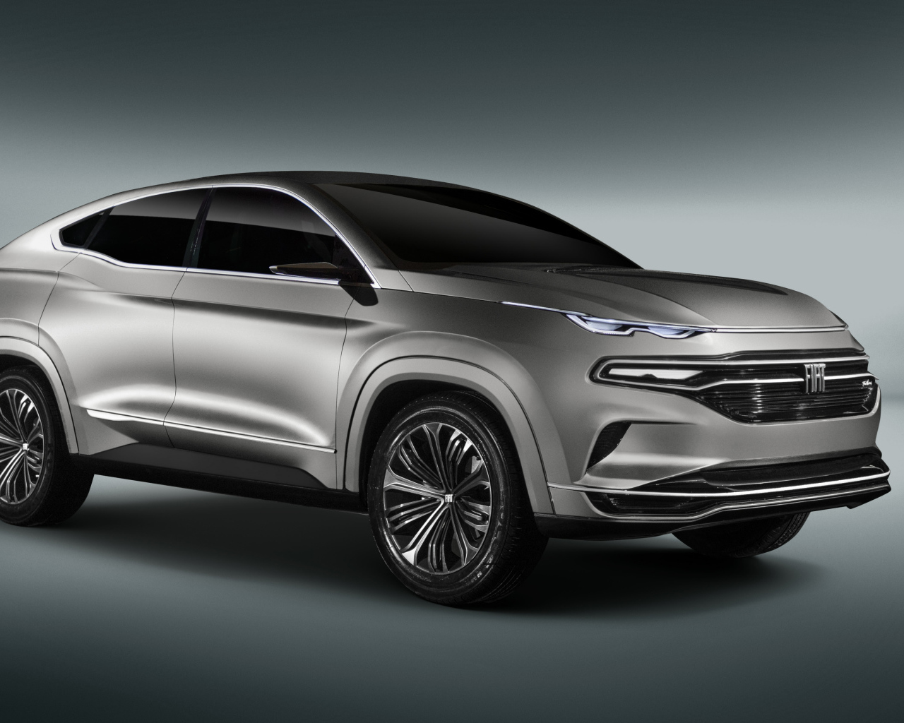 Внедорожник Fiat Fastback, 2018 года на сером фоне
