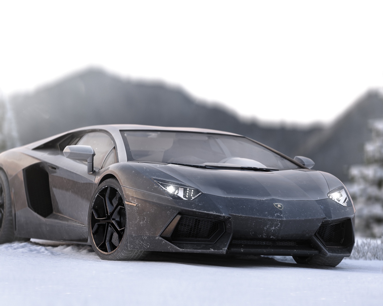 Серый спортивный автомобиль Lamborghini Aventador на снегу