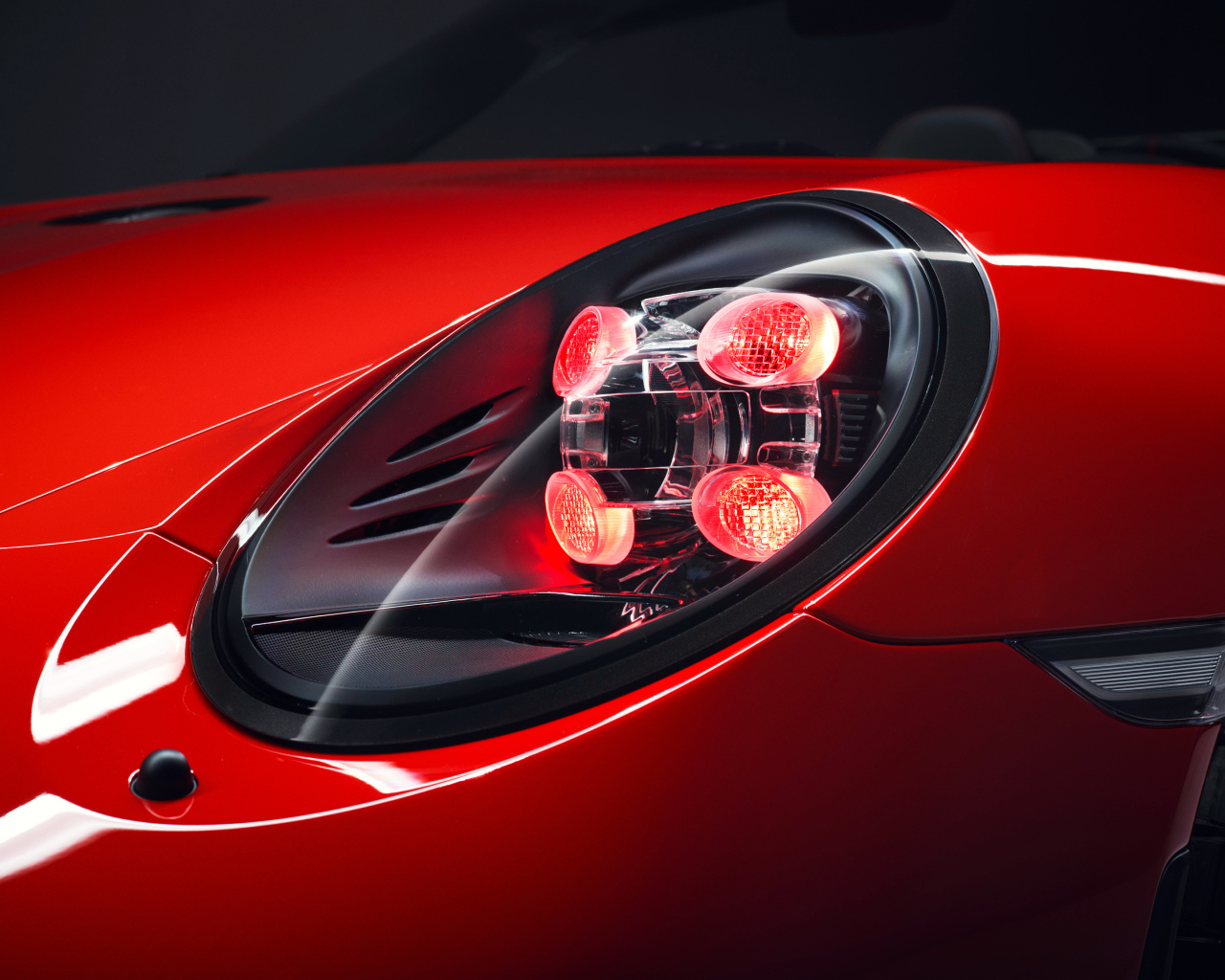 Фара красного автомобиля Porsche 911 Speedster