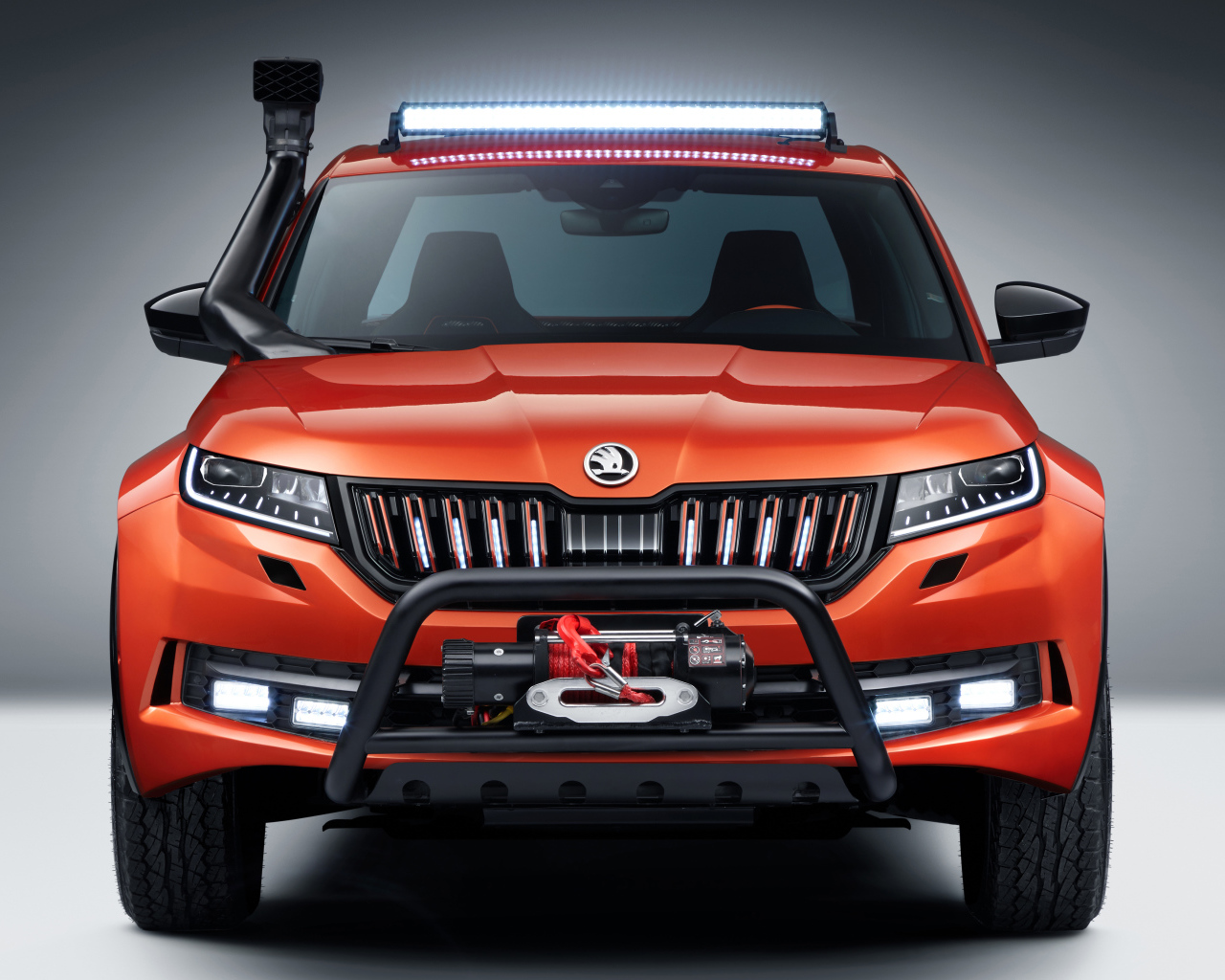 Red 2019 SUV Skoda Mountiaq Concept on a gray background