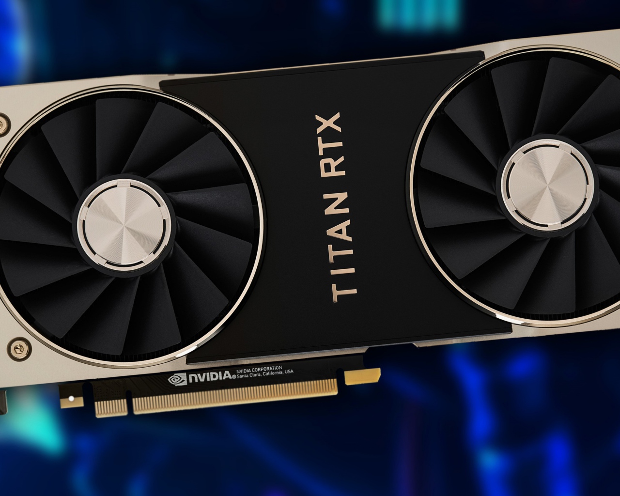Новая видеокарта Nvidia Titan RTX на синем фоне крупным планом