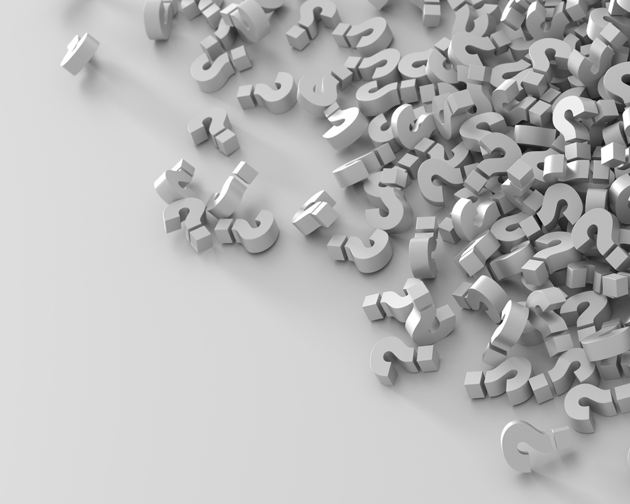 Много знаков вопроса на серой поверхности 