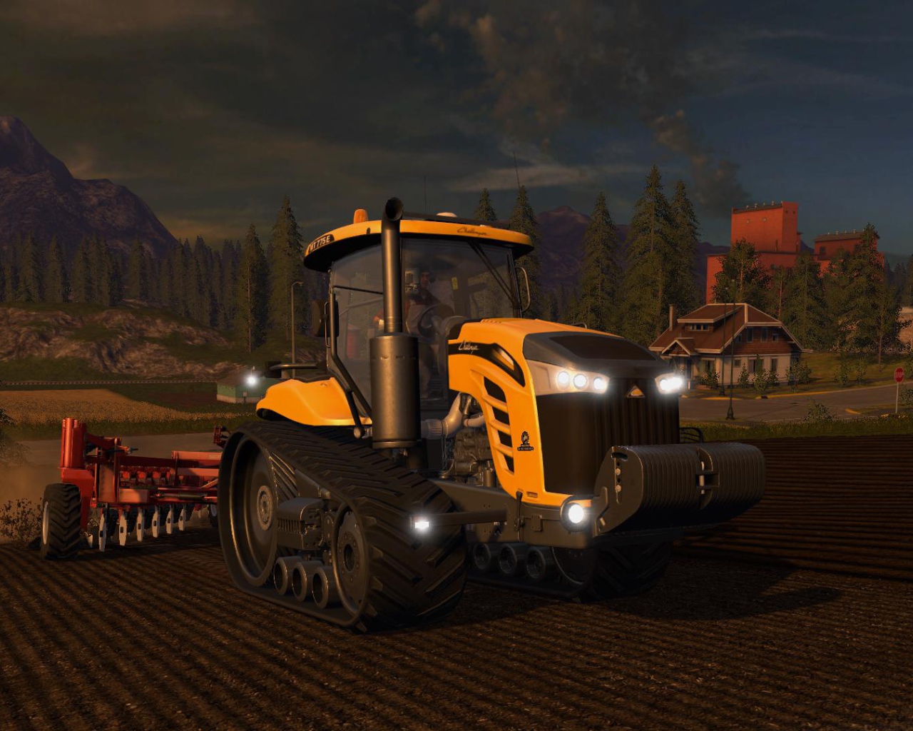 Желтый трактор пашет поле вечером видео игра Farming Simulator 