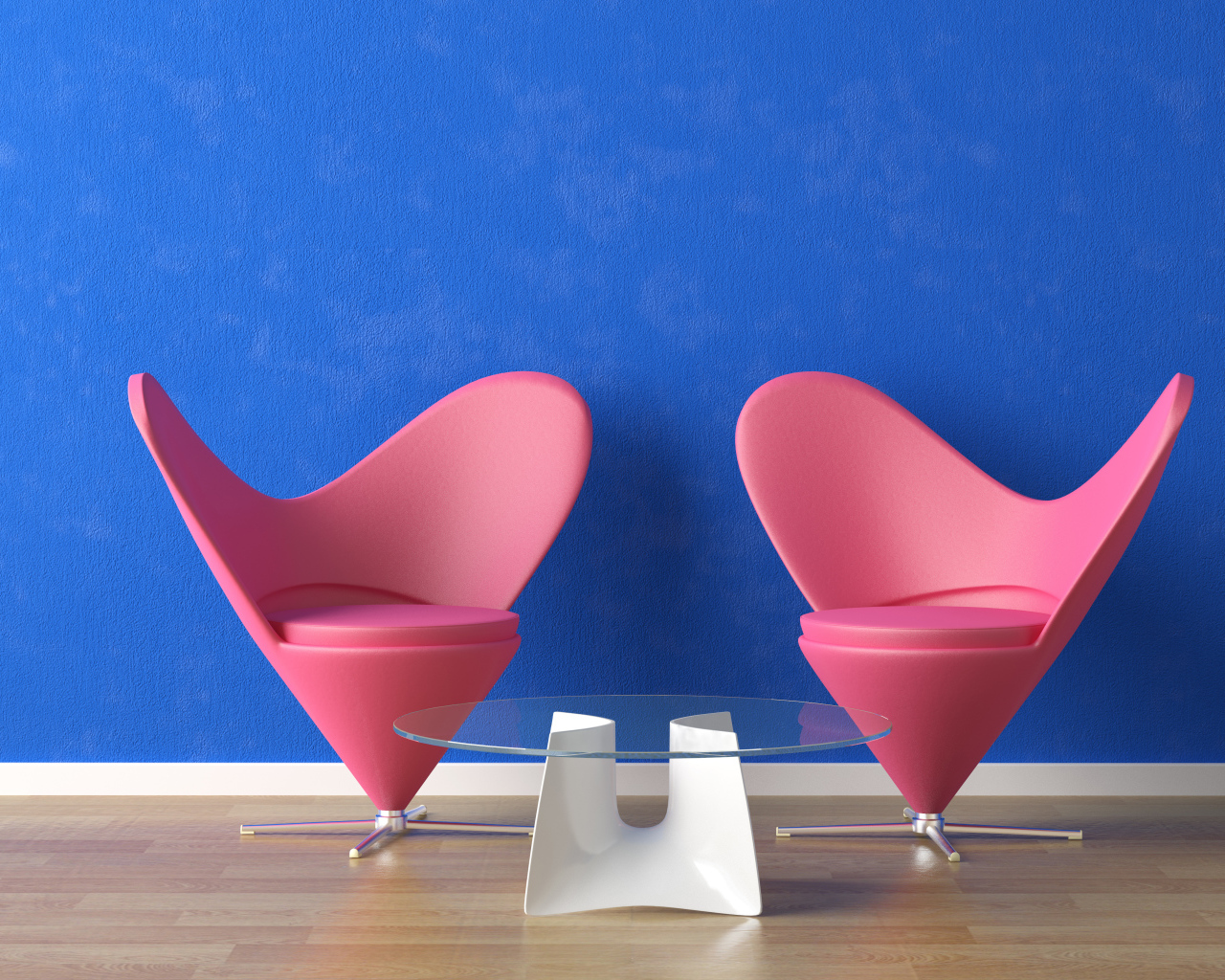Два розовых кресла и стеклянный столик у синей стены 