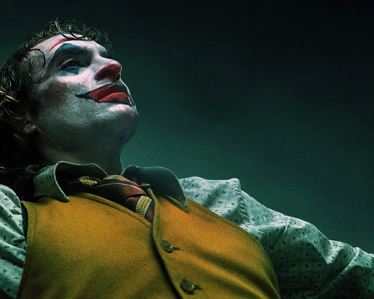 Актер Хоакин Феникс в фильме Джокер, 2019