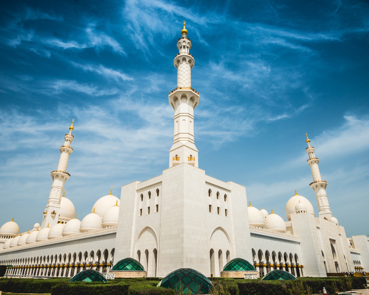 White mosque under a beautiful blue sky