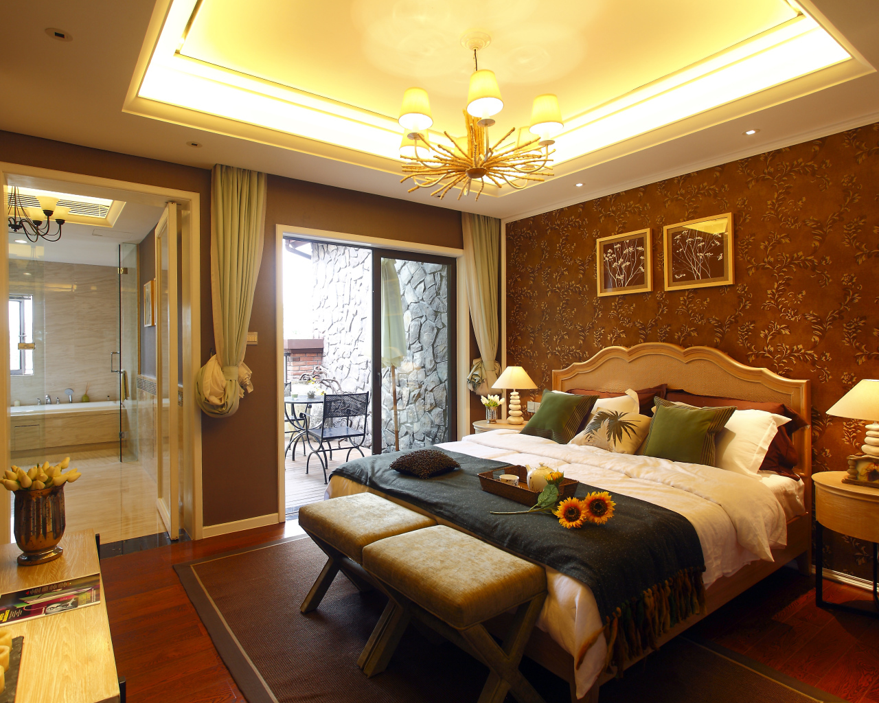 Красивая спальня с большой кроватью и телевизором 