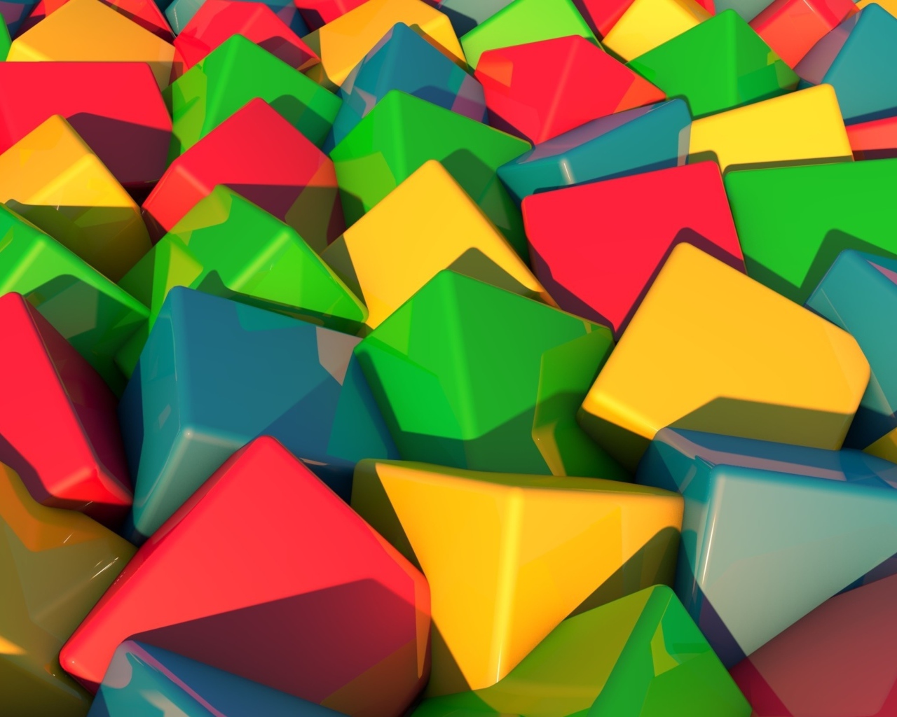 Много разноцветных пластмассовых кубиком