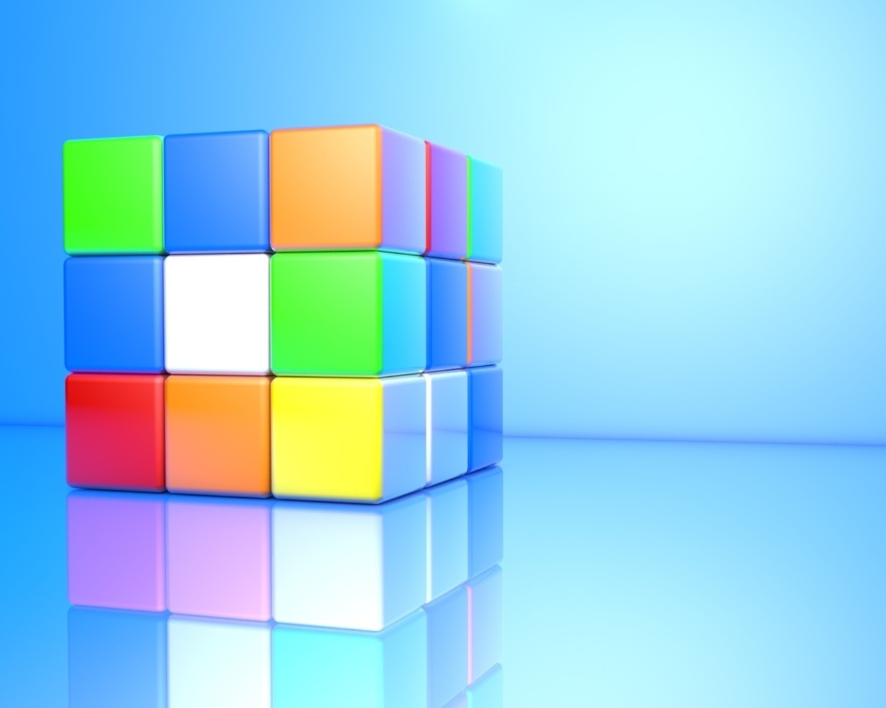 Разноцветный кубик Рубика на голубом фоне 3д графика