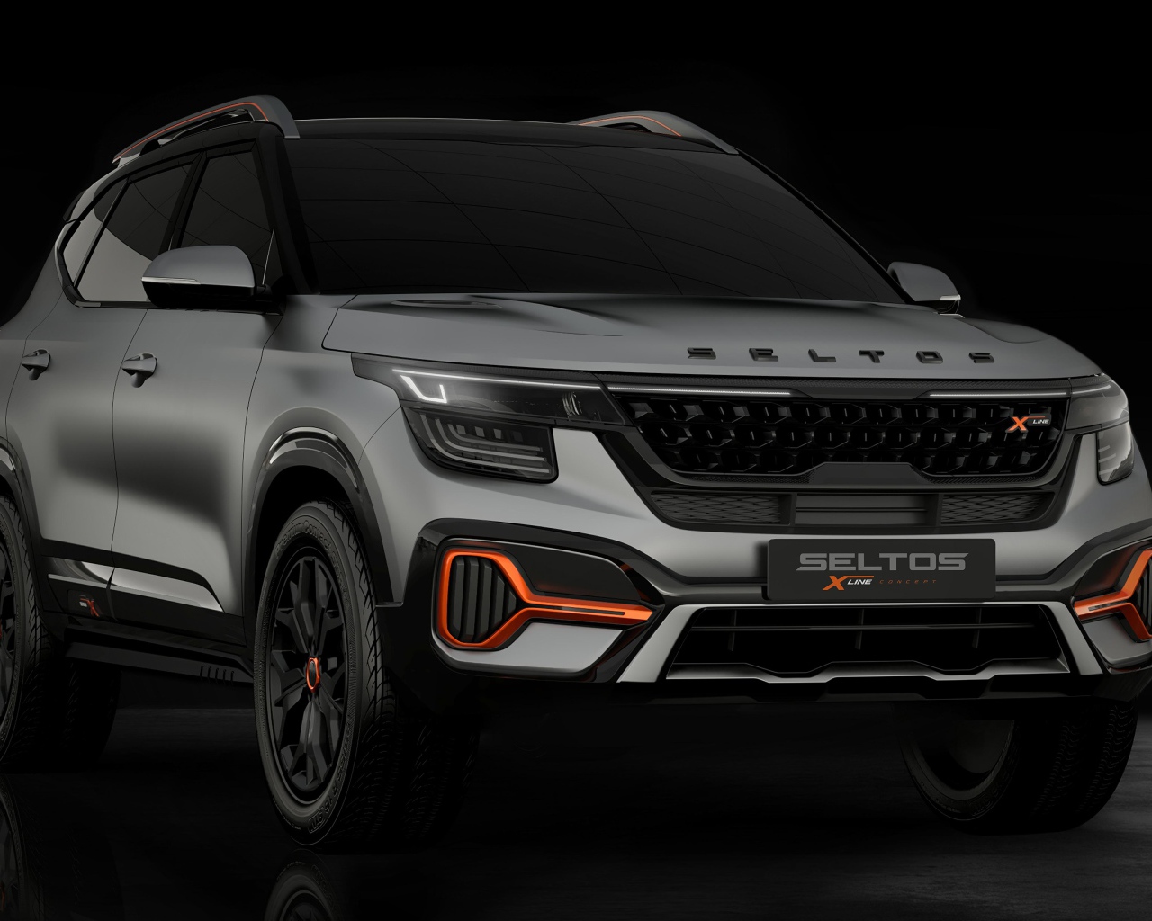 Автомобиль Kia Seltos X-Line Concept 2020 года на черном фоне 