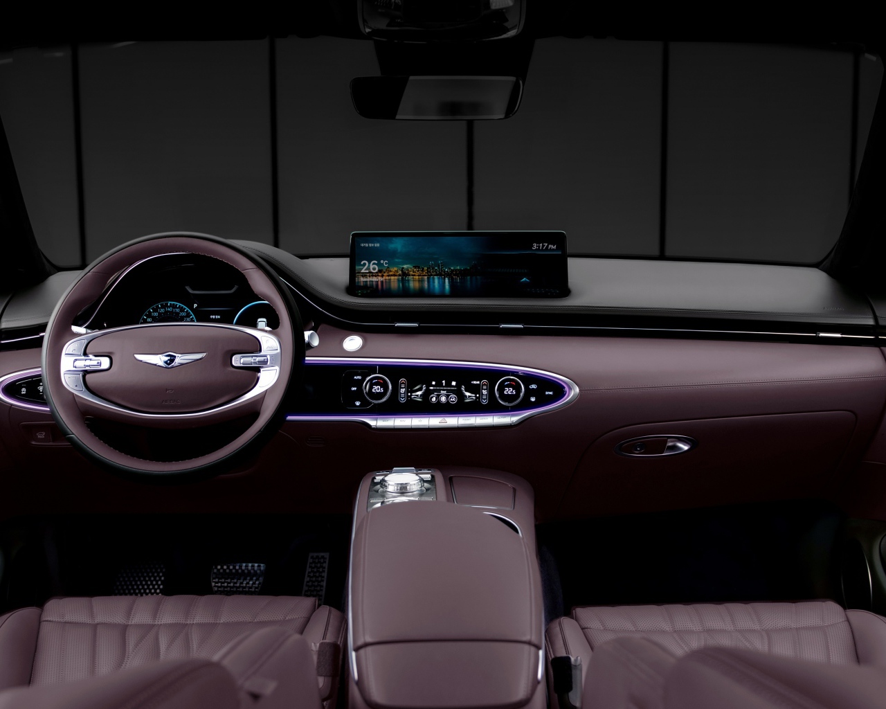 Коричневый салон автомобиля Genesis GV70 2021 года