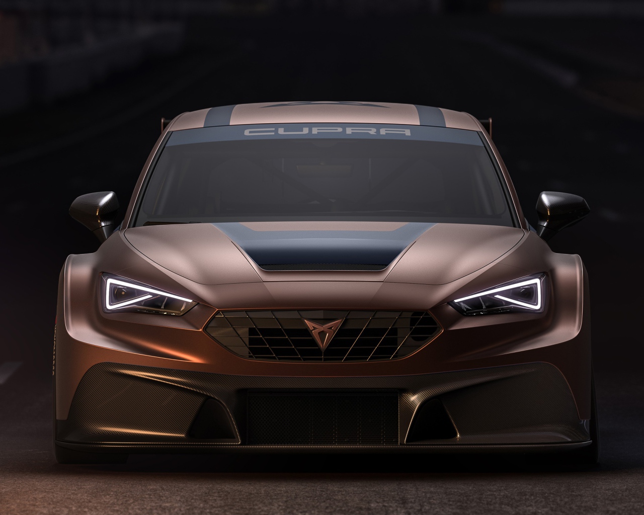 Коричневый автомобиль Cupra Leon Competition 2020 года вид спереди