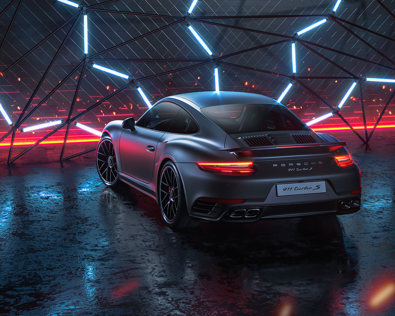 Серебристый автомобиль Porsche 911 Turbo S 