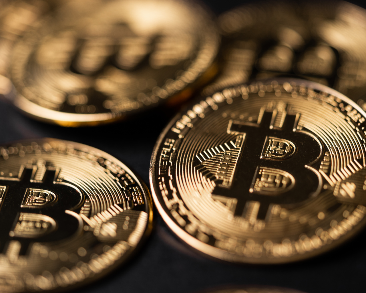 Gold coins bitcoin close up