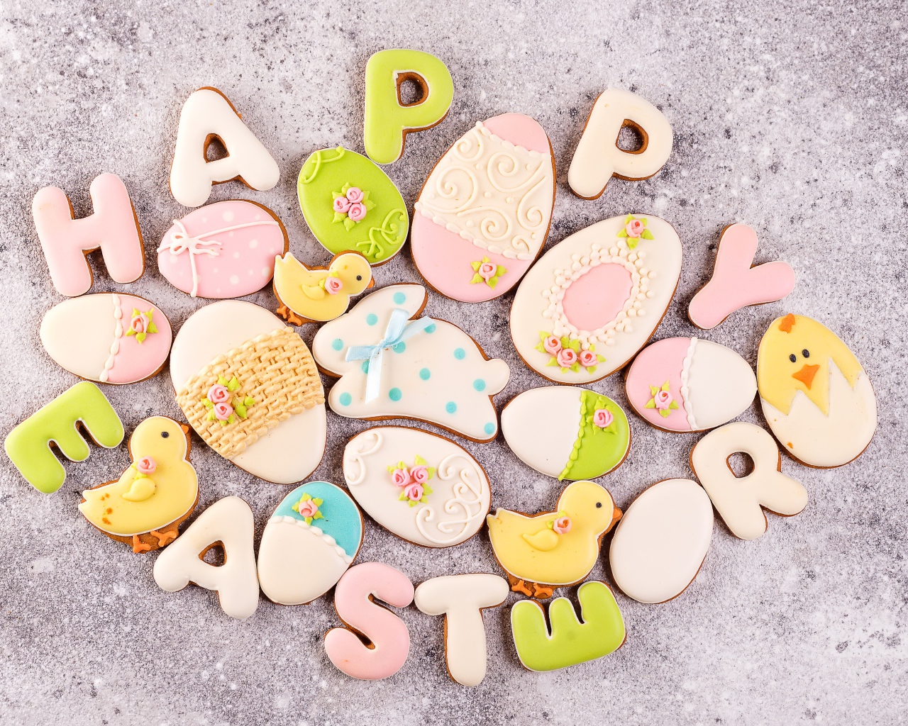 Happy Easter cookies on a gray table