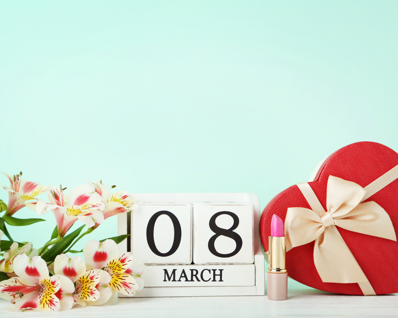 Альстромерия и подарок на голубом фоне на 8 марта