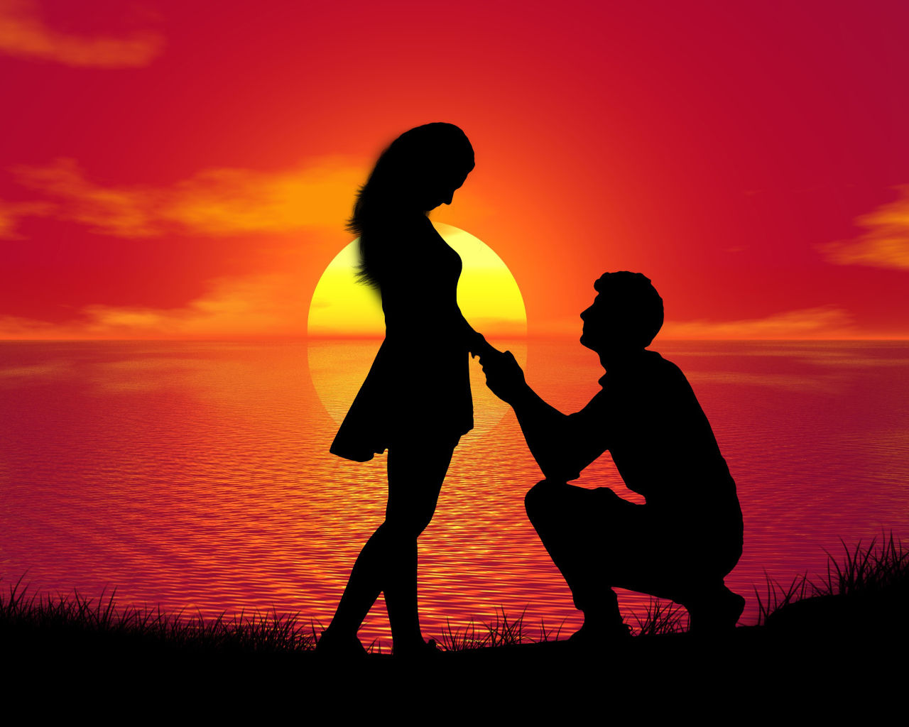 Парень делает девушке предложение на фоне заката у моря