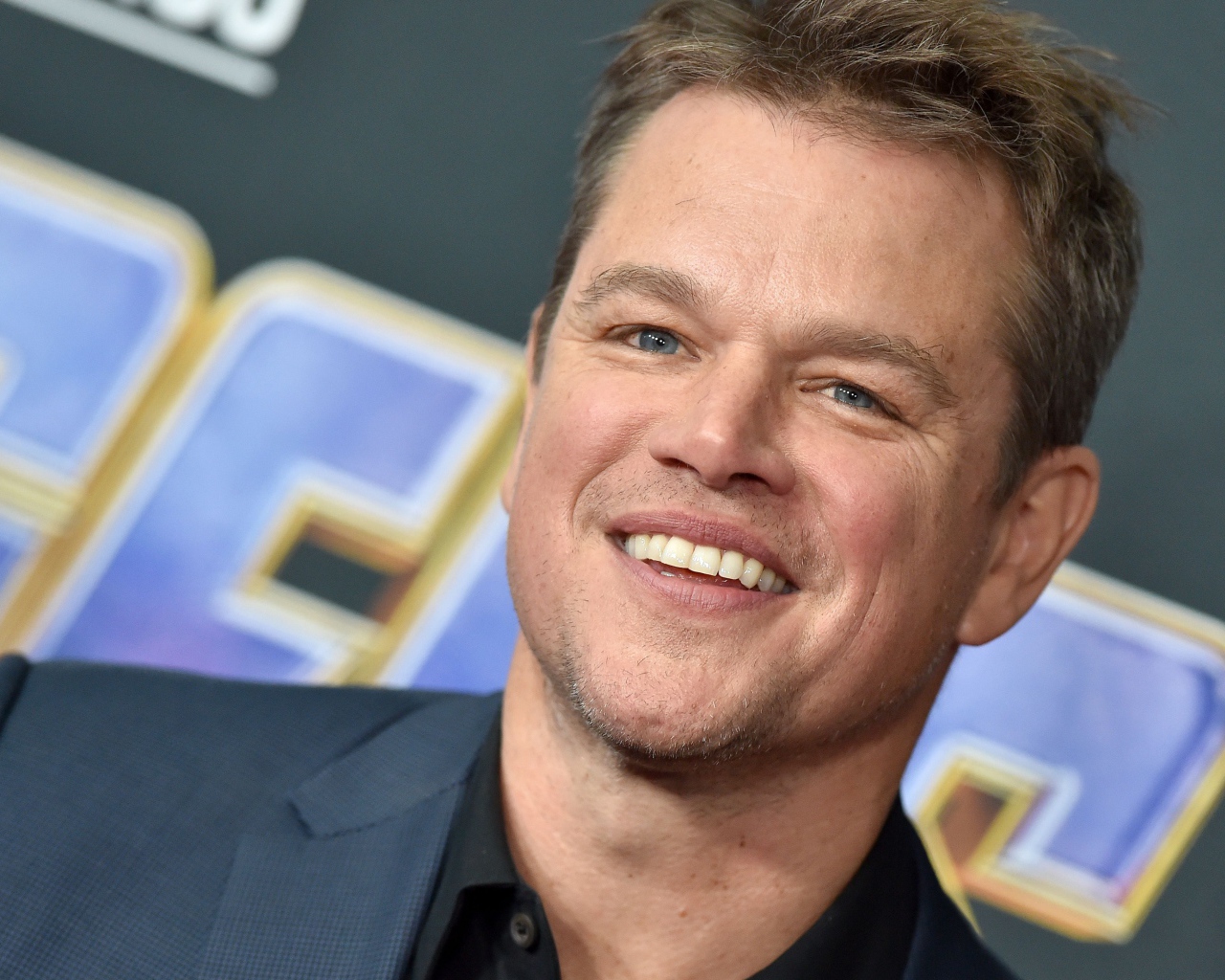 Голубоглазый актер Мэтт Деймон с улыбкой на лице