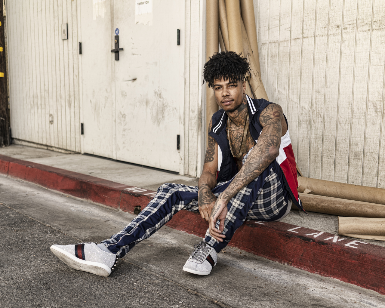 Американский рэпер Blueface  с татуировками на теле