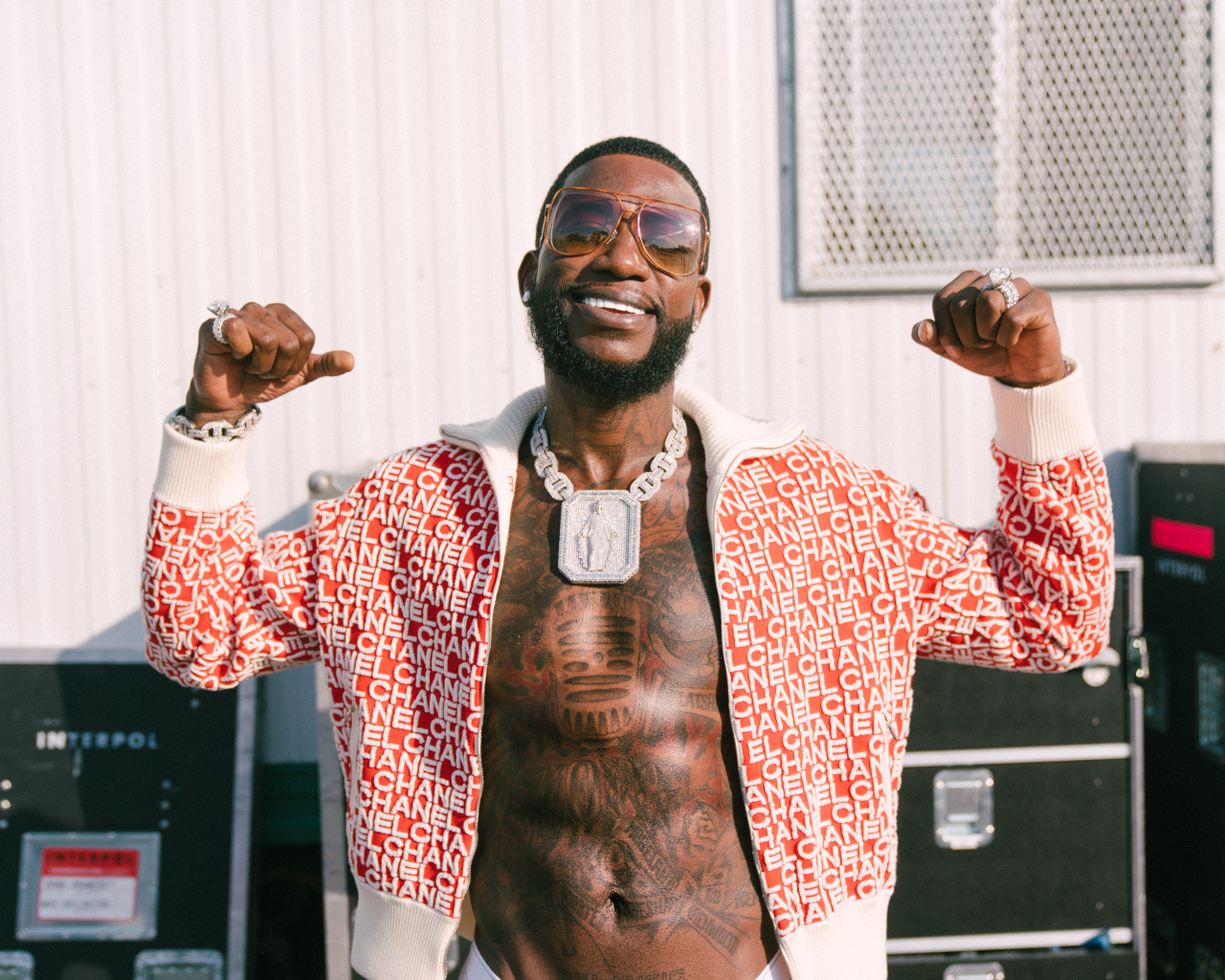 Американский рэпер  Gucci Mane с татуировками на теле