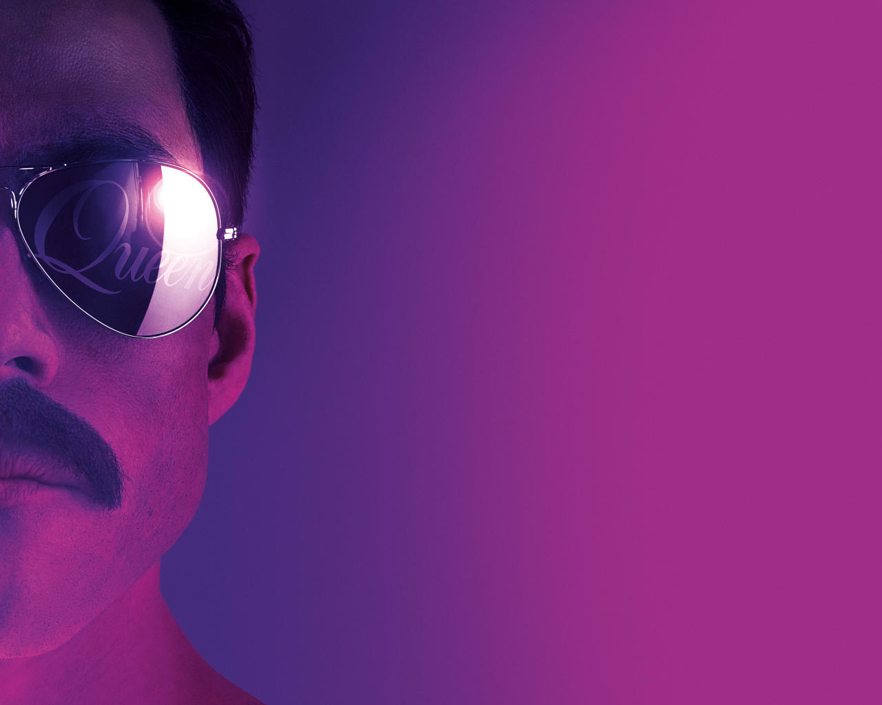 Легендарный певец Фредди Меркьюри на розовом фоне