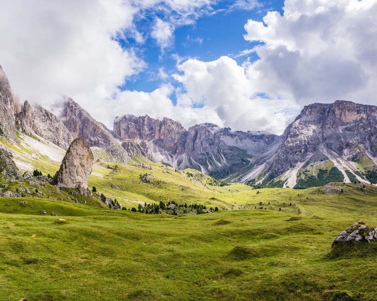 Nice view of the green hills at the foot of the mountains