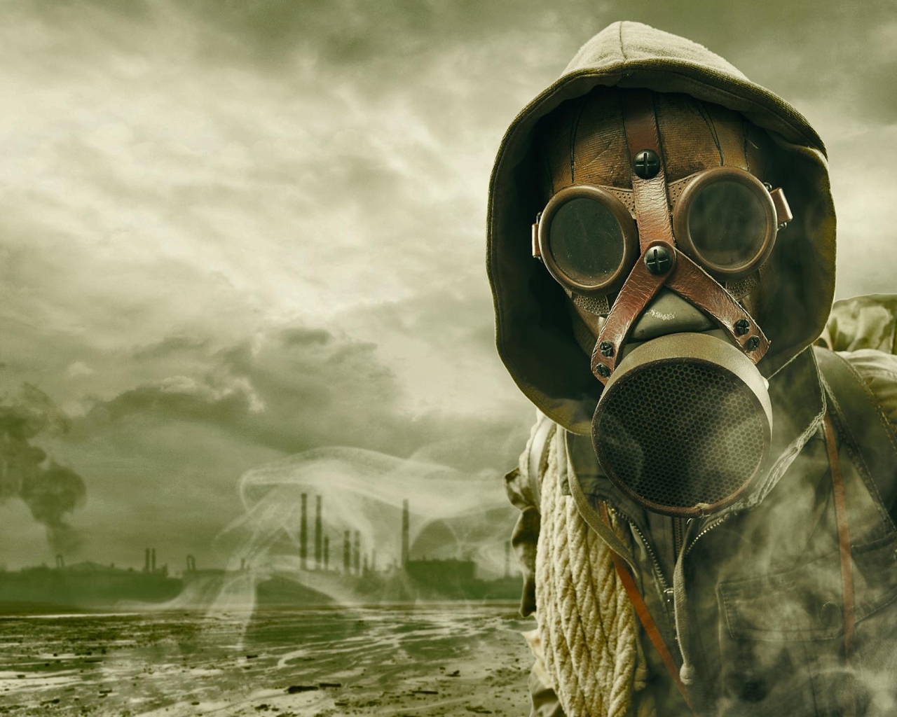 Мужчина в противогазе во вромя пандемии коронавируса 