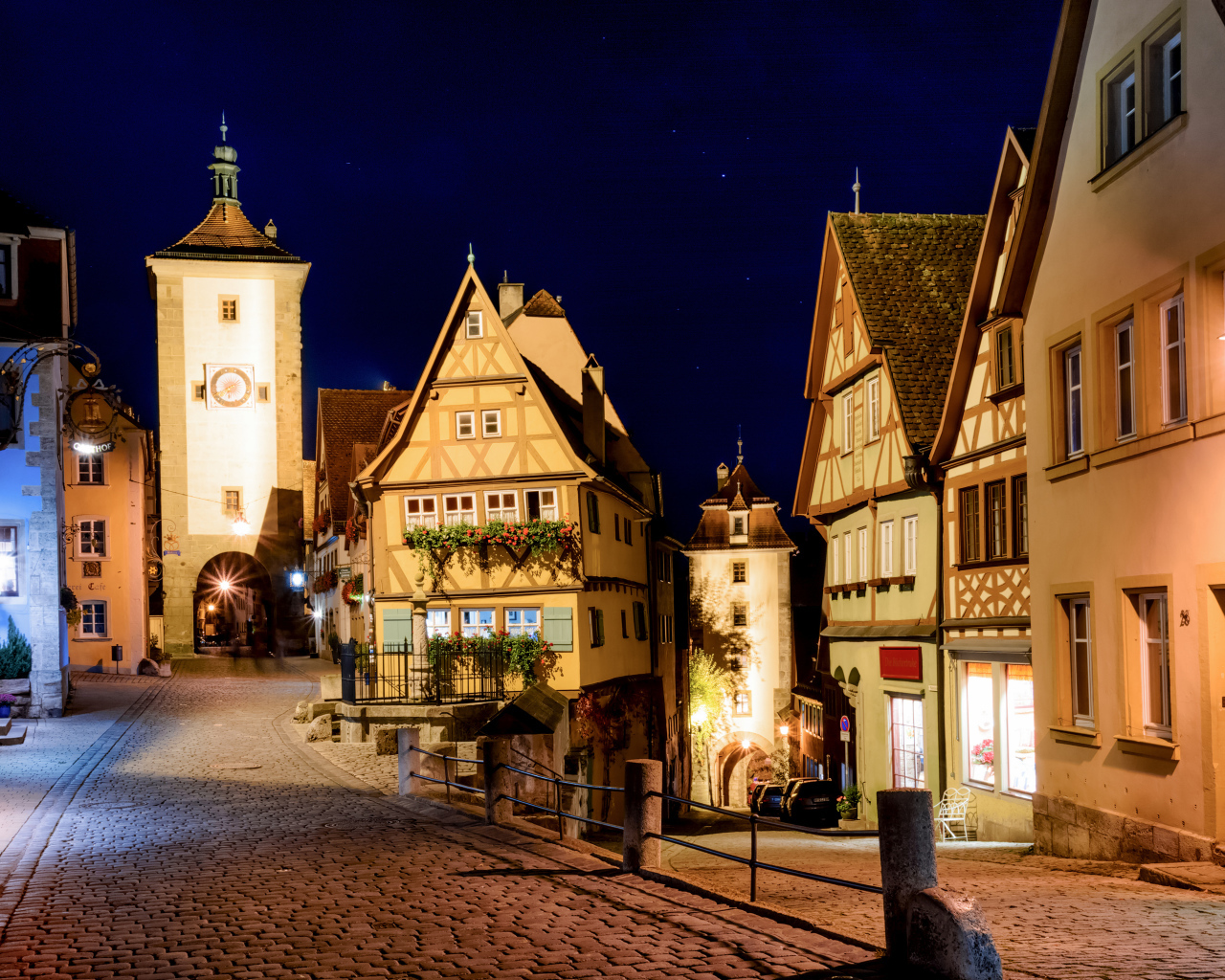 Beautiful houses on the night street of Rothenburg city, Germany