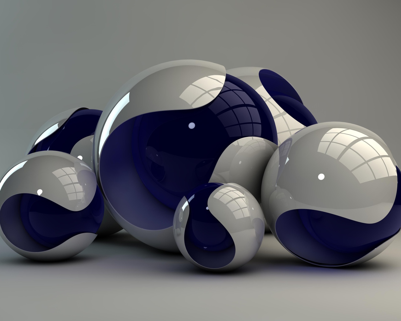 Шары разного размера на сером фоне 3д