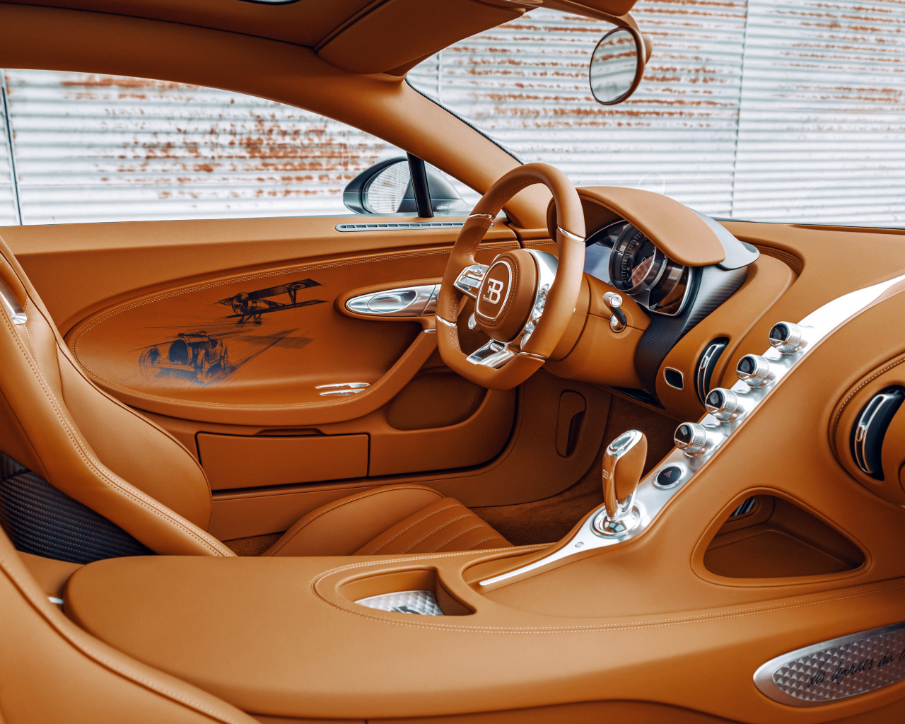 Коричневый кожаный салон автомобиля Bugatti Chiron