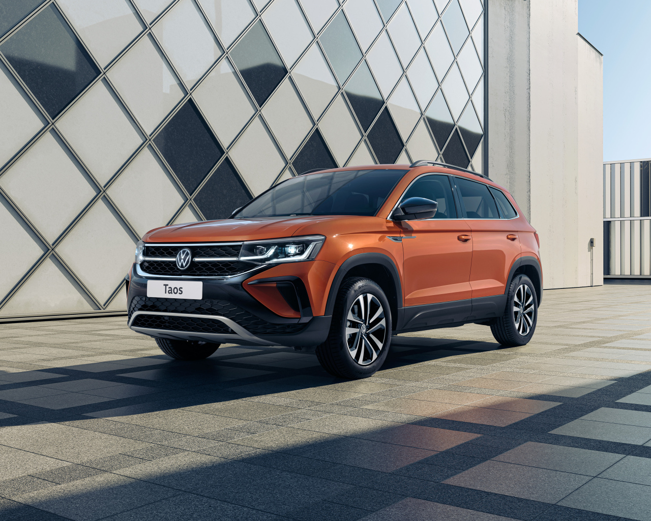 Внедорожник Volkswagen Taos 4MOTION 2021 года у стены