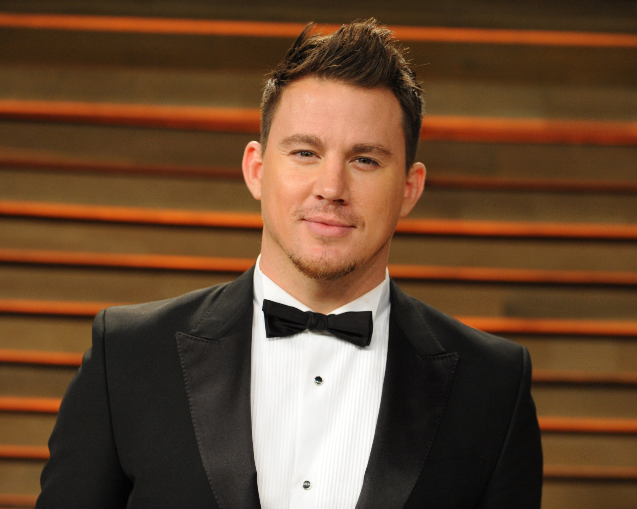 Американский актер Ченнинг Татум у стены