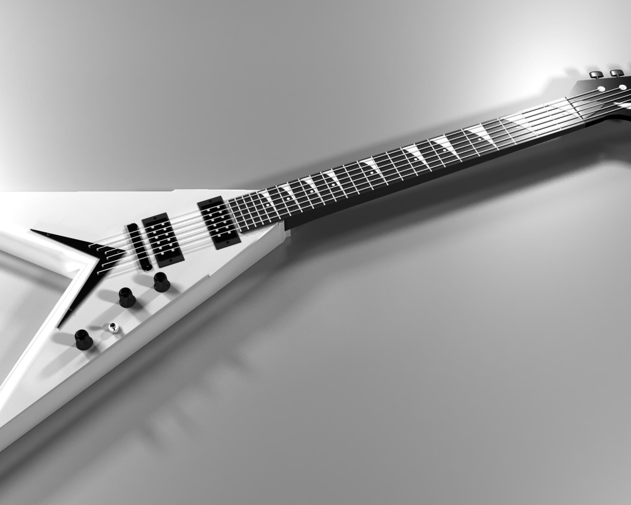 Белая электрогитара на сером фоне 