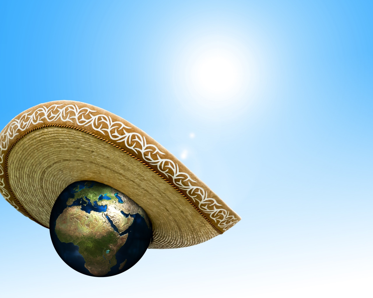 Планета земля в сомбреро на голубом фоне