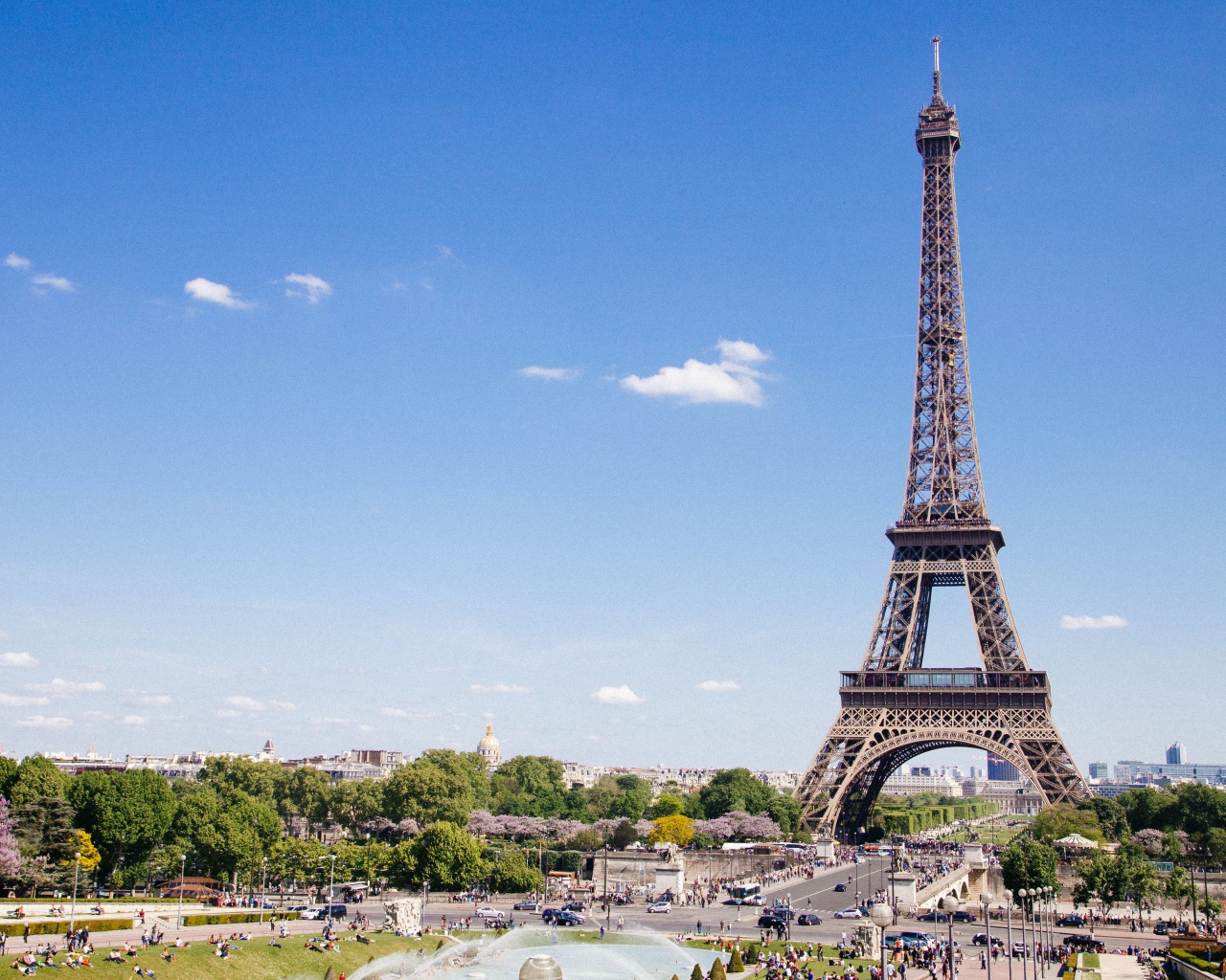 Nice view of the famous Eiffel Tower under the blue sky, Paris