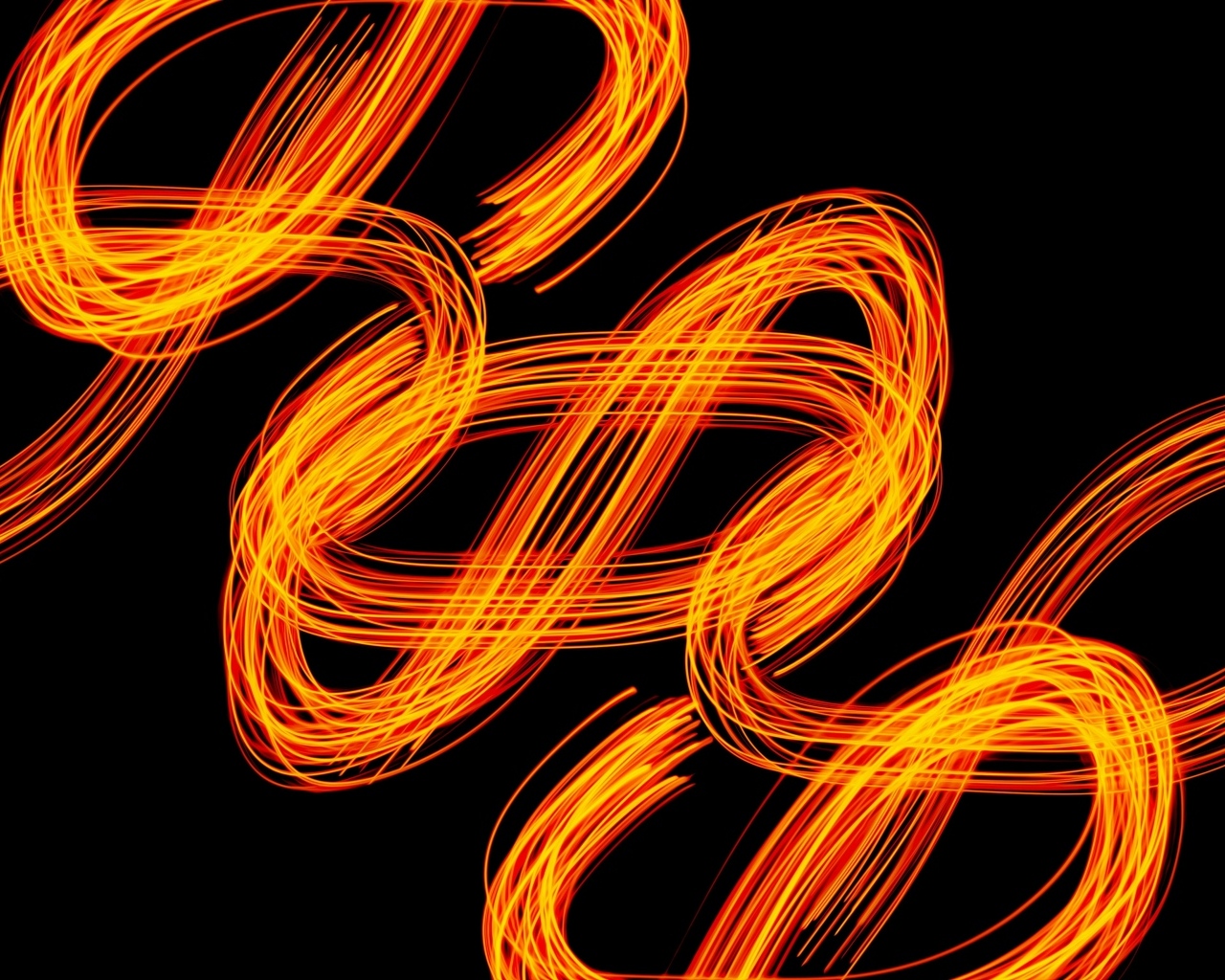Огненные завитки на черном фоне