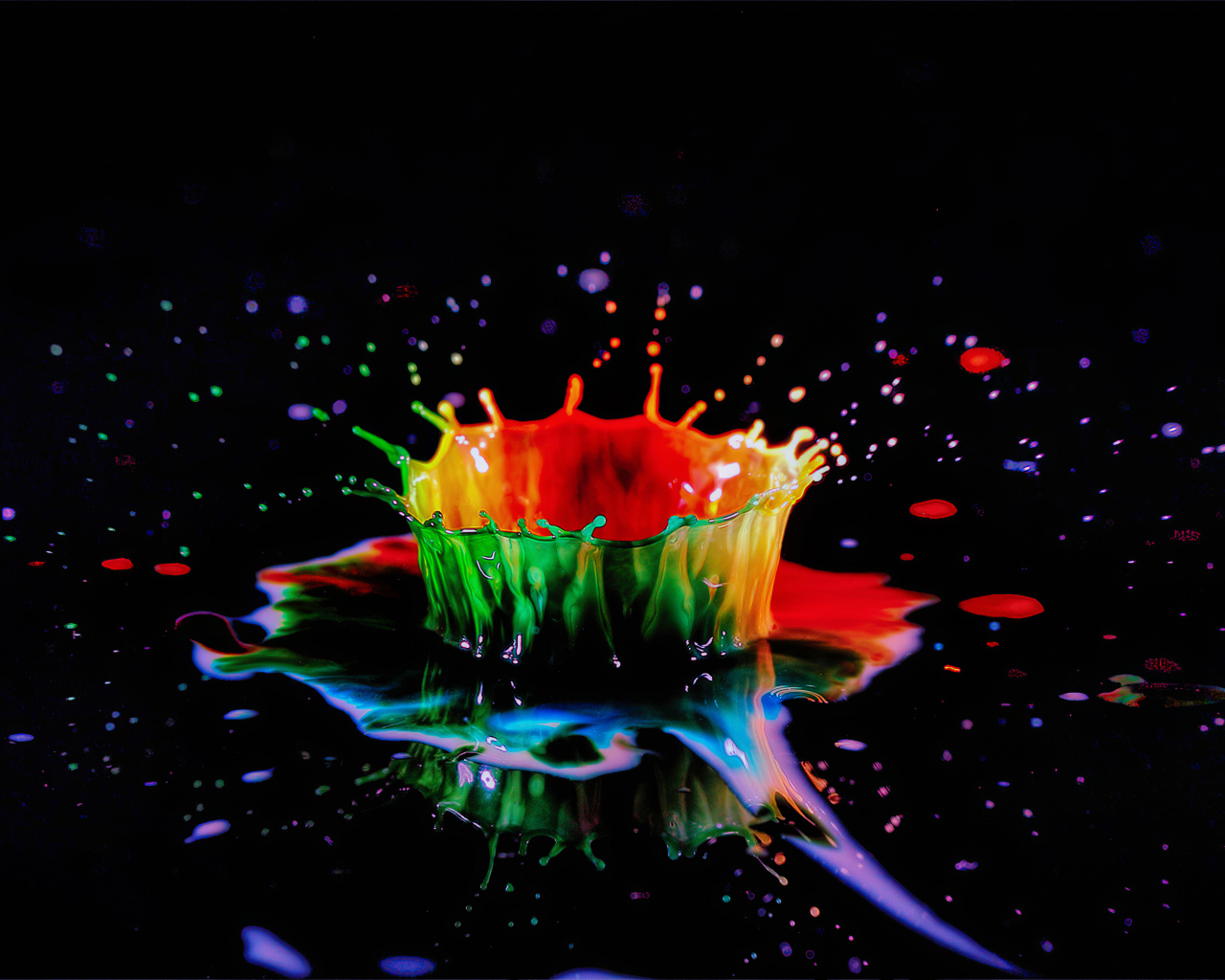 Брызги разноцветной краски на черном фоне 3д графика
