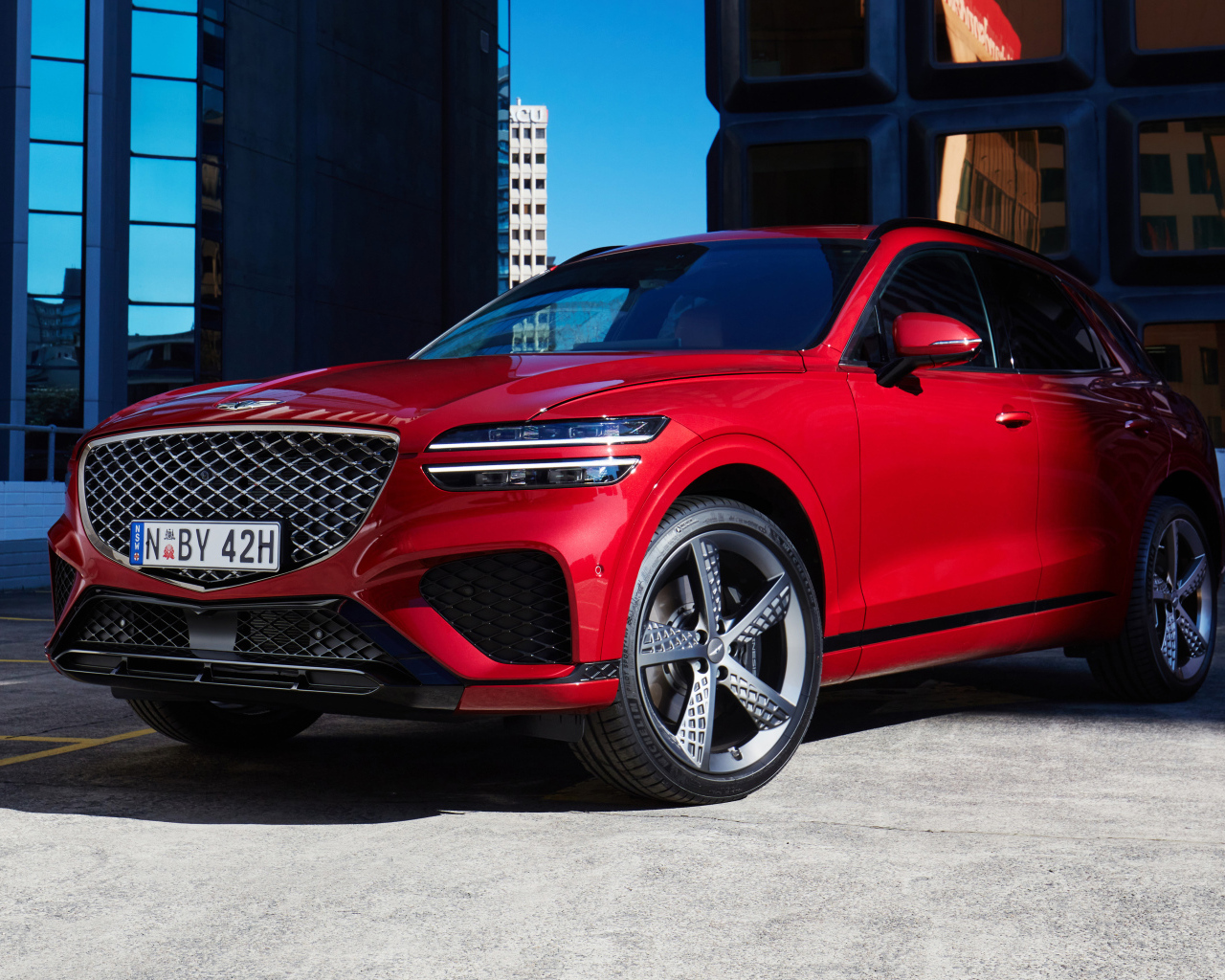 Красный блестящий Genesis GV70 2.5T AWD 2023