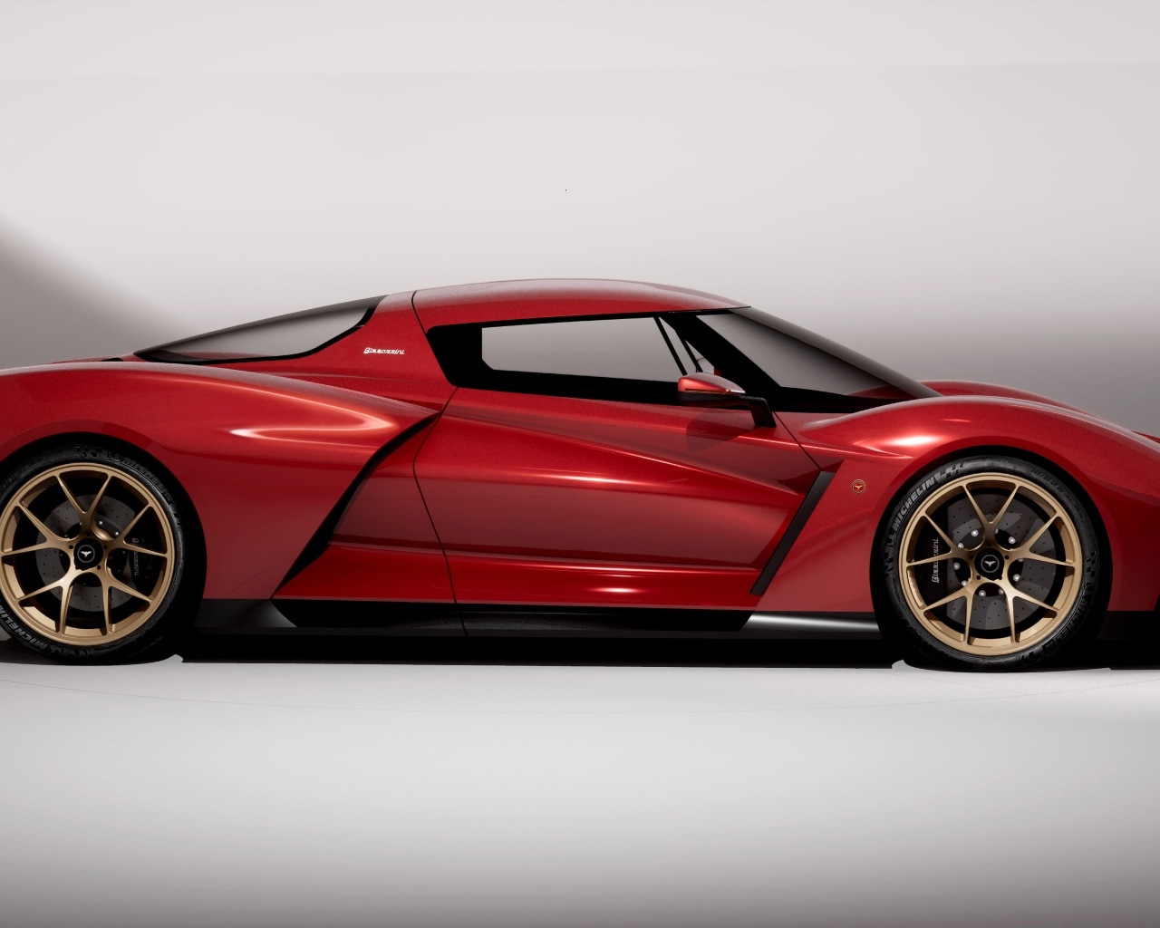 Красный автомобиль Bizzarrini The Giotto вид сбоку