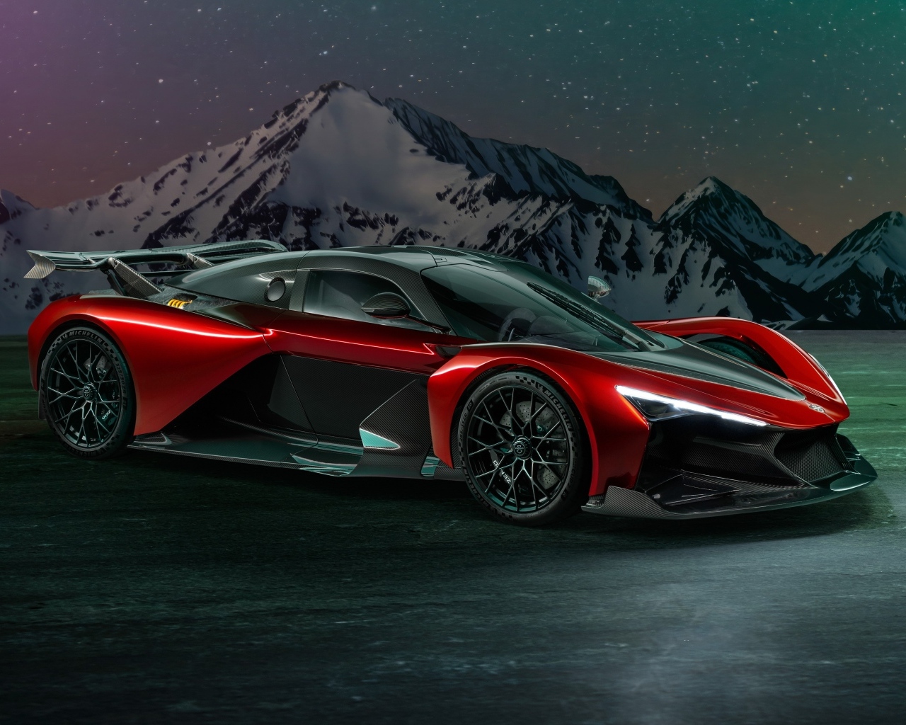 Красный спорткар Zenvo Aurora Agil  на фоне гор