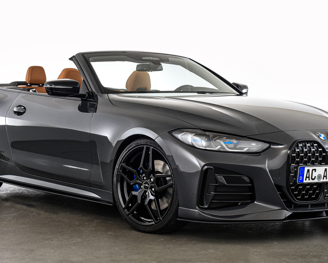 Серебристый кабриолет BMW 4 Series Cabrio 2021 года