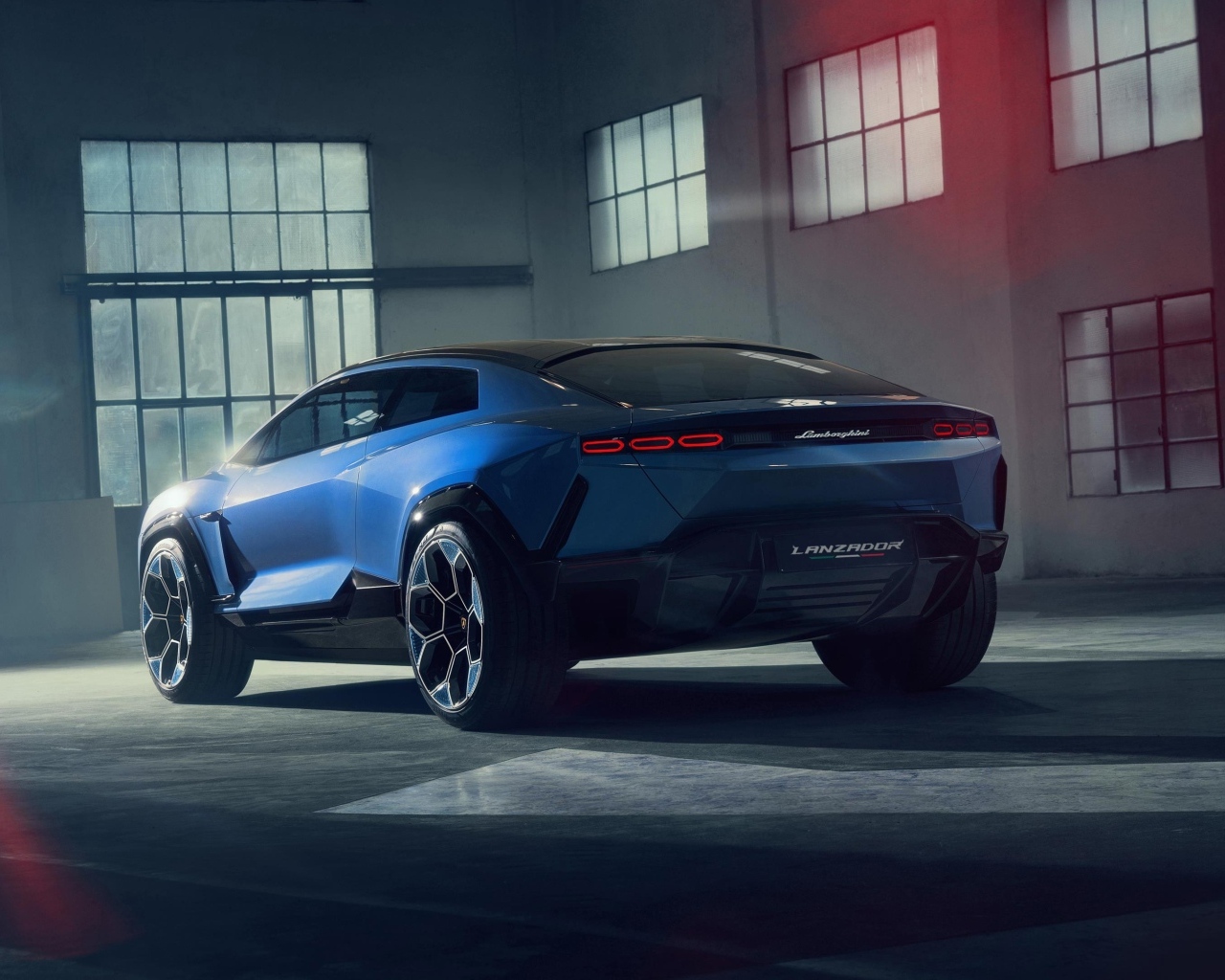 Синий автомобиль Lamborghini Lanzador Concept EV вид сзади