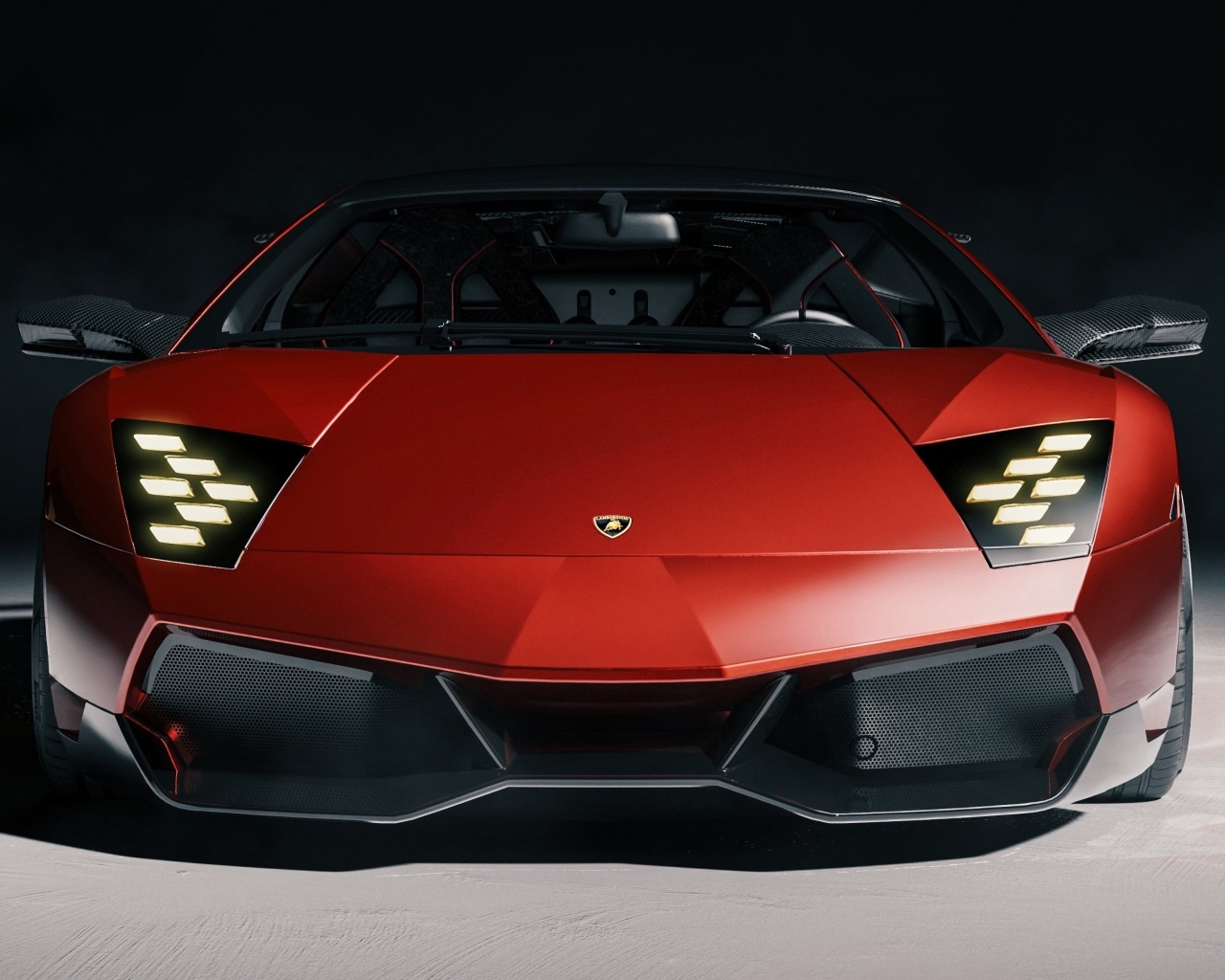 Вид спереди на красный автомобиль  Lamborghini Murcielago