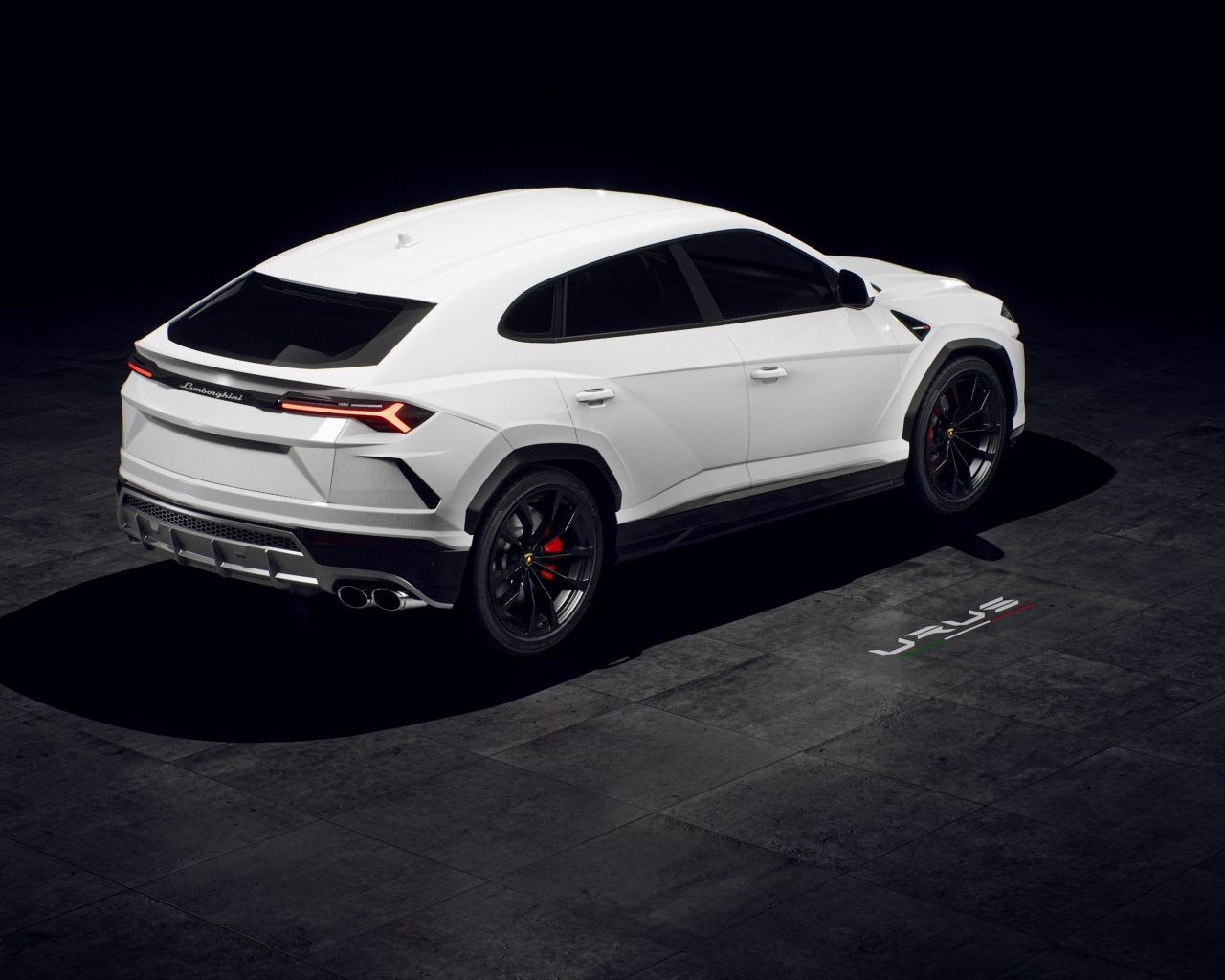 Белый внедорожник Lamborghini Urus вид сзади