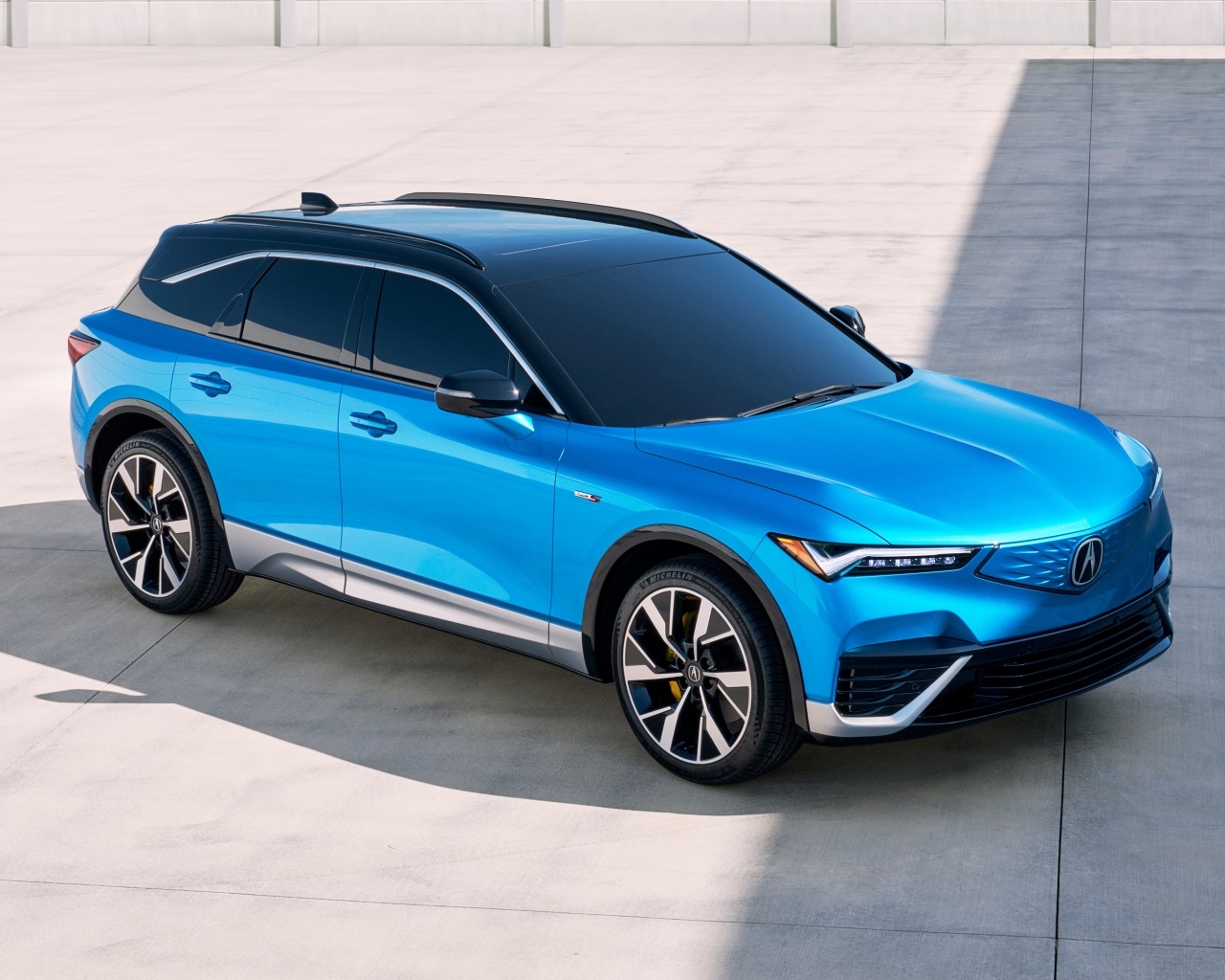 Голубой автомобиль Acura ZDX Type S 2024 года