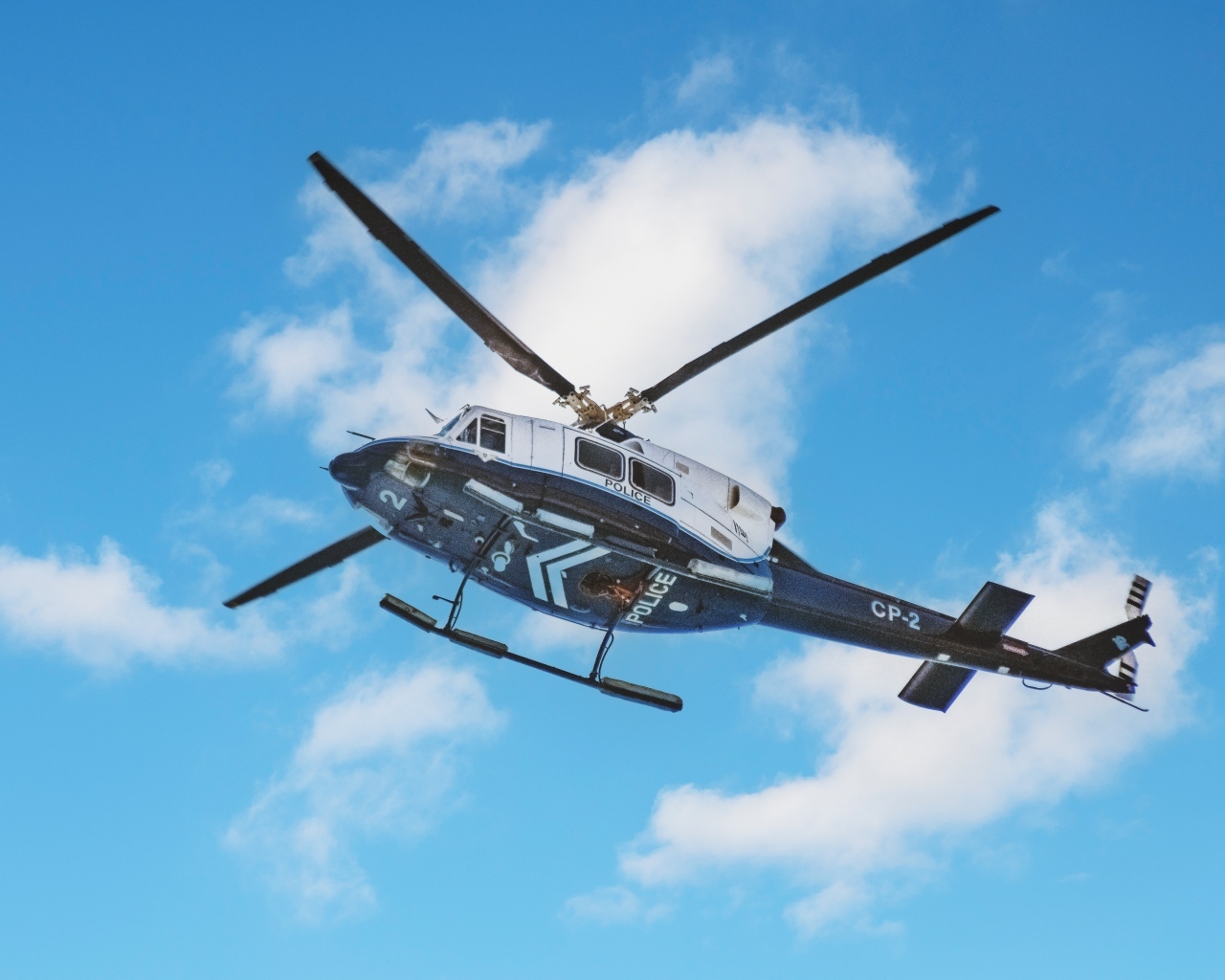Police helicopter in blue sky