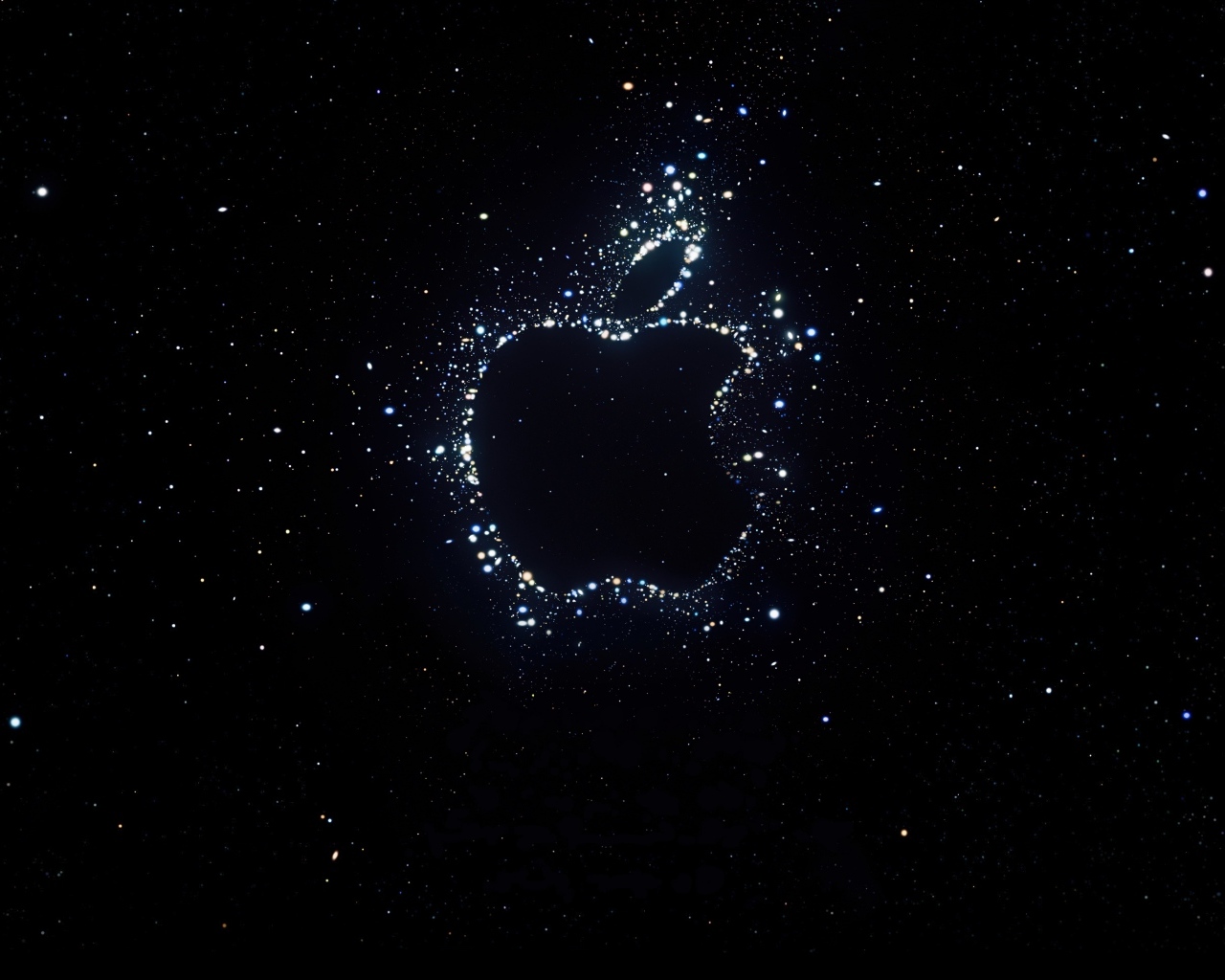 Блестящий логотип Apple на черном фоне