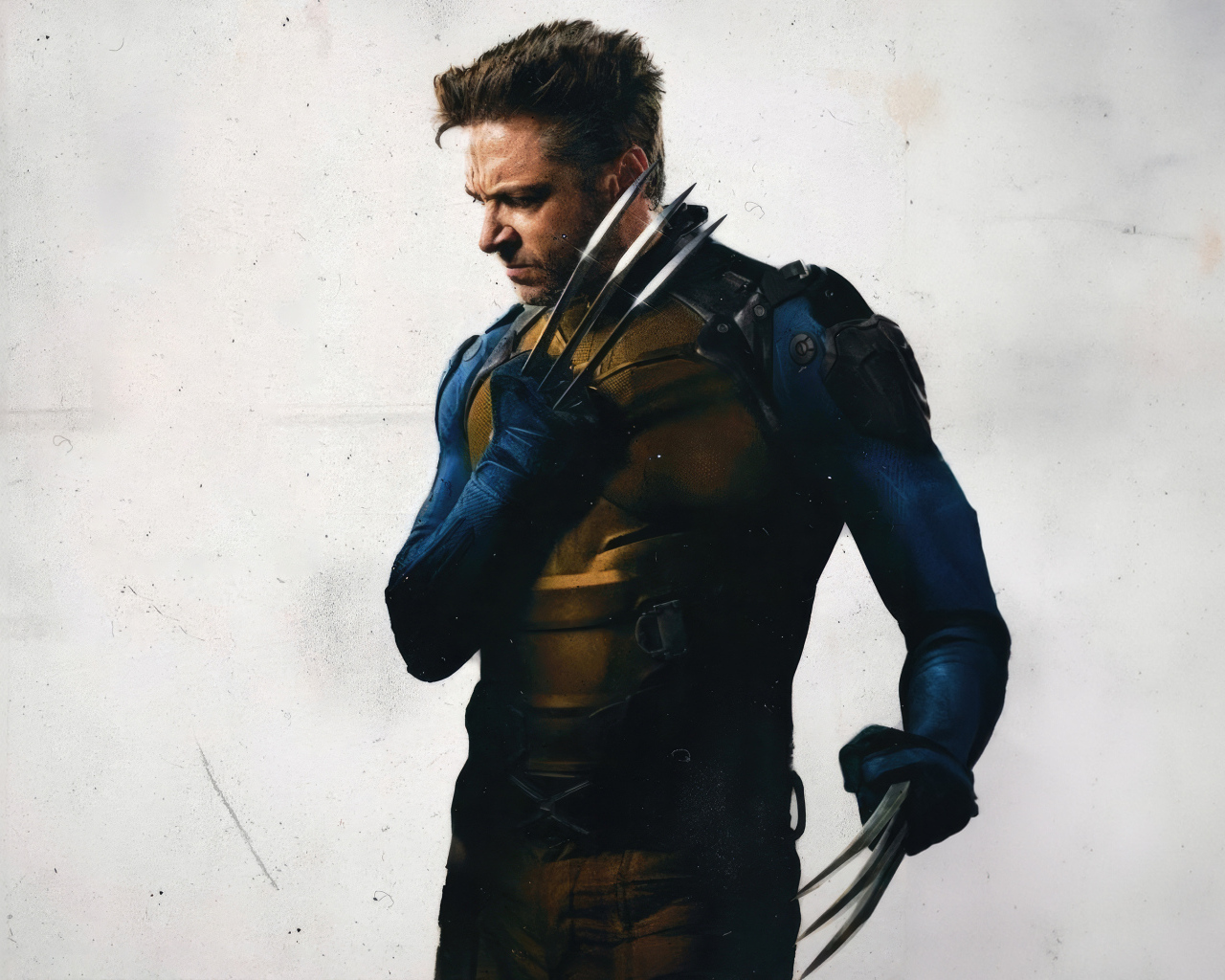 Супергерой Росомаха на сером фоне