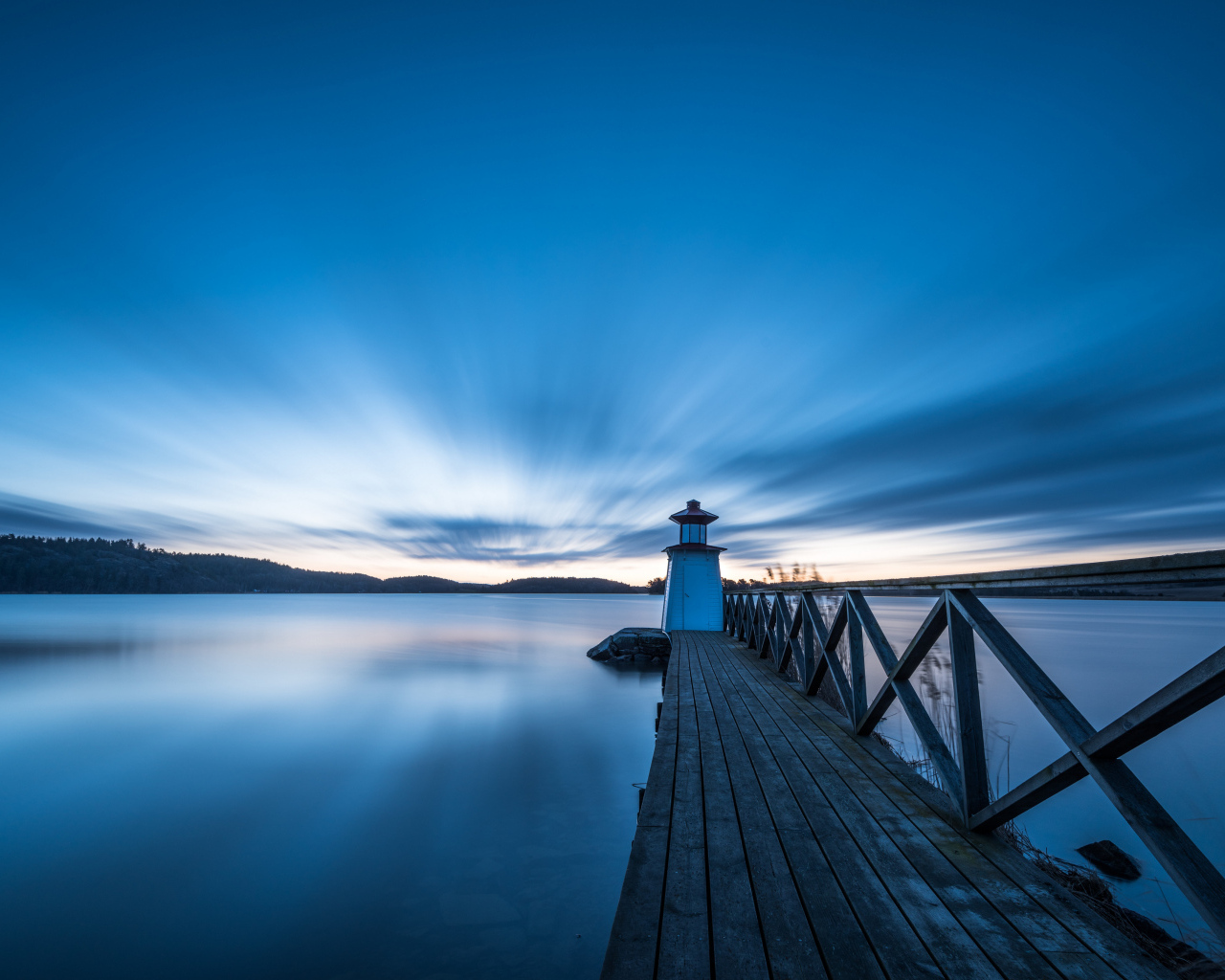 Wooden jetty against a beautiful sky