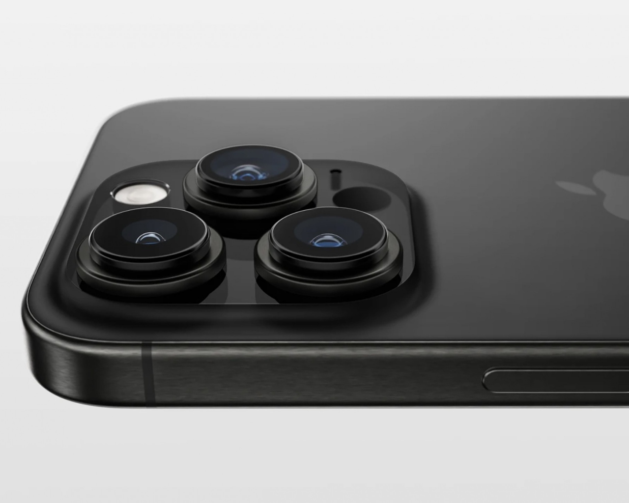 Черный iPhone 15 на сером фоне